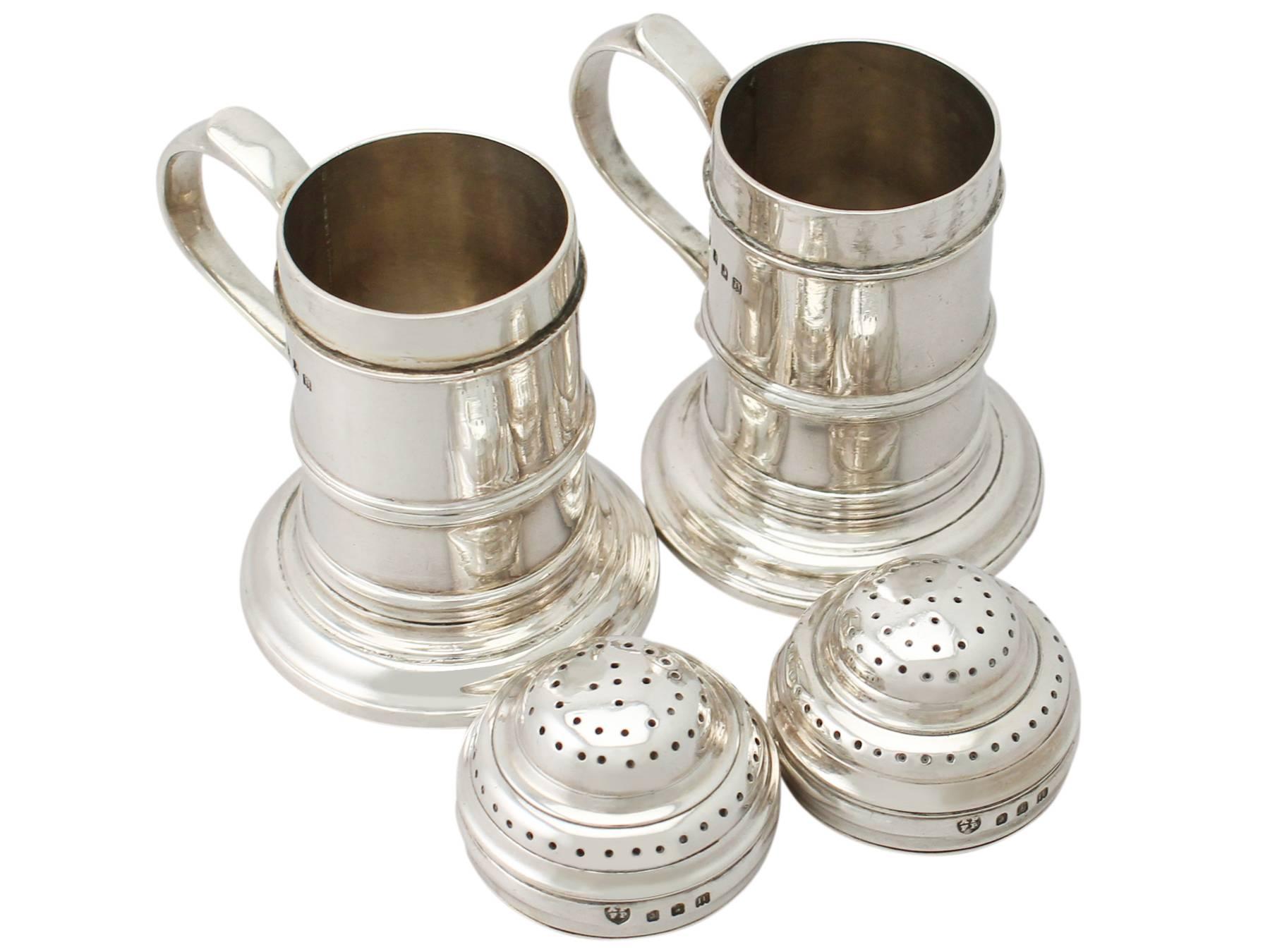 A fine and impressive pair of antique George V English Britannia standard silver kitchen peppers by Tessiers Ltd; an addition to our silver cruet and condiments collection

These impressive antique George V Britannia standard* silver peppers have a