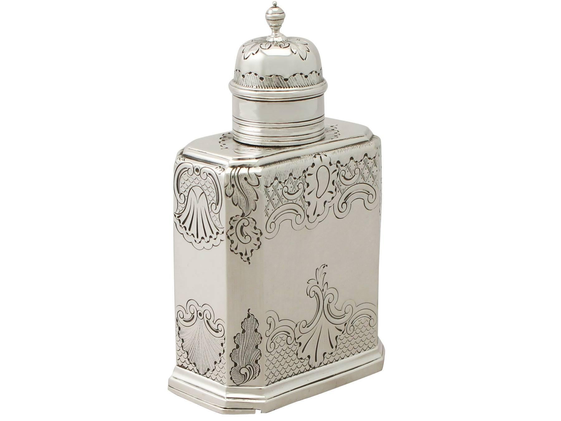 An exceptional, fine and impressive antique Victorian English Britannia standard silver tea caddy in the George I style; an addition to our silver teaware collection.

This exceptional antique Victorian Britannia standard* silver tea caddy has a