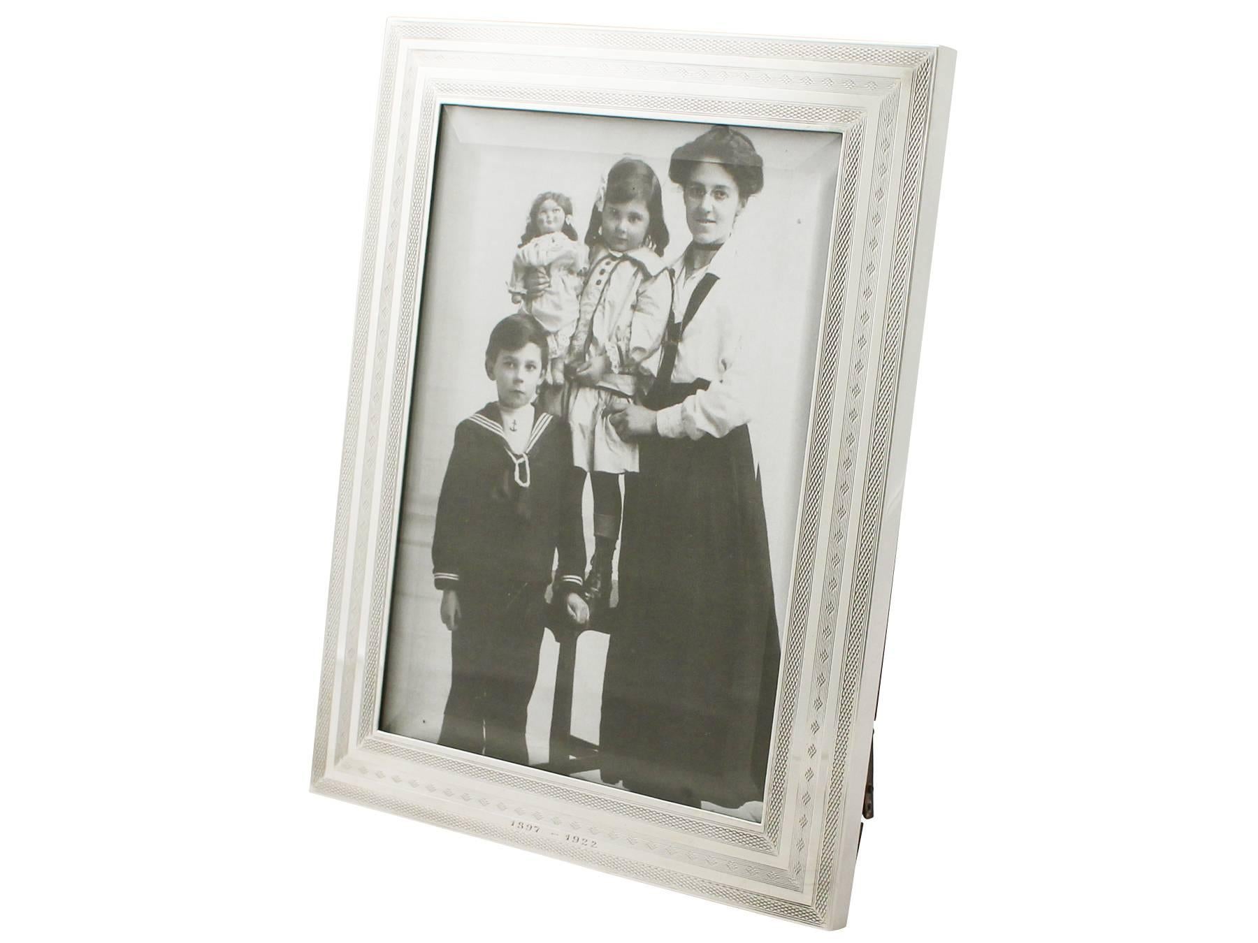 An exceptional, fine and impressive antique George V English sterling silver photograph frame; an addition to our ornamental silverware collection

This exceptional antique George V sterling silver photo frame has a plain rectangular form.

The