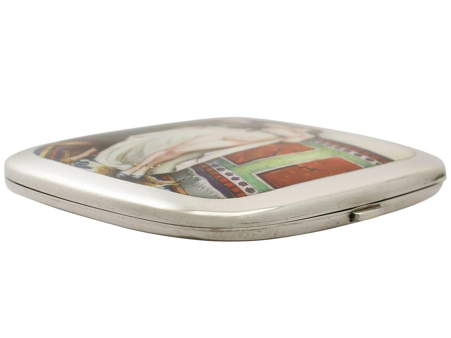 An exceptional, fine and impressive antique German 900 standard silver and erotica enamel cigarette case; an addition to our diverse range of collectable silverware

This exceptional antique German 900 standard silver cigarette case has a plain