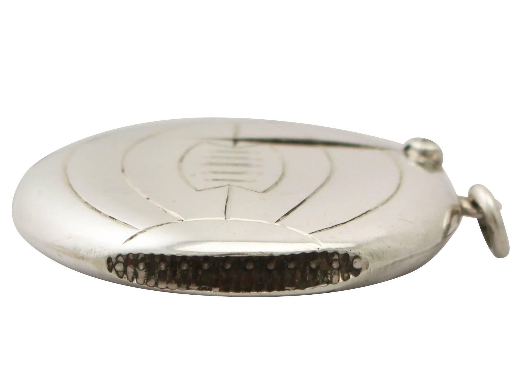 An exceptional, fine and impressive antique Edwardian English sterling silver vesta case with football interest; an addition to our sports related silverware collection

This exceptional antique Edwardian English sterling silver vesta case has
