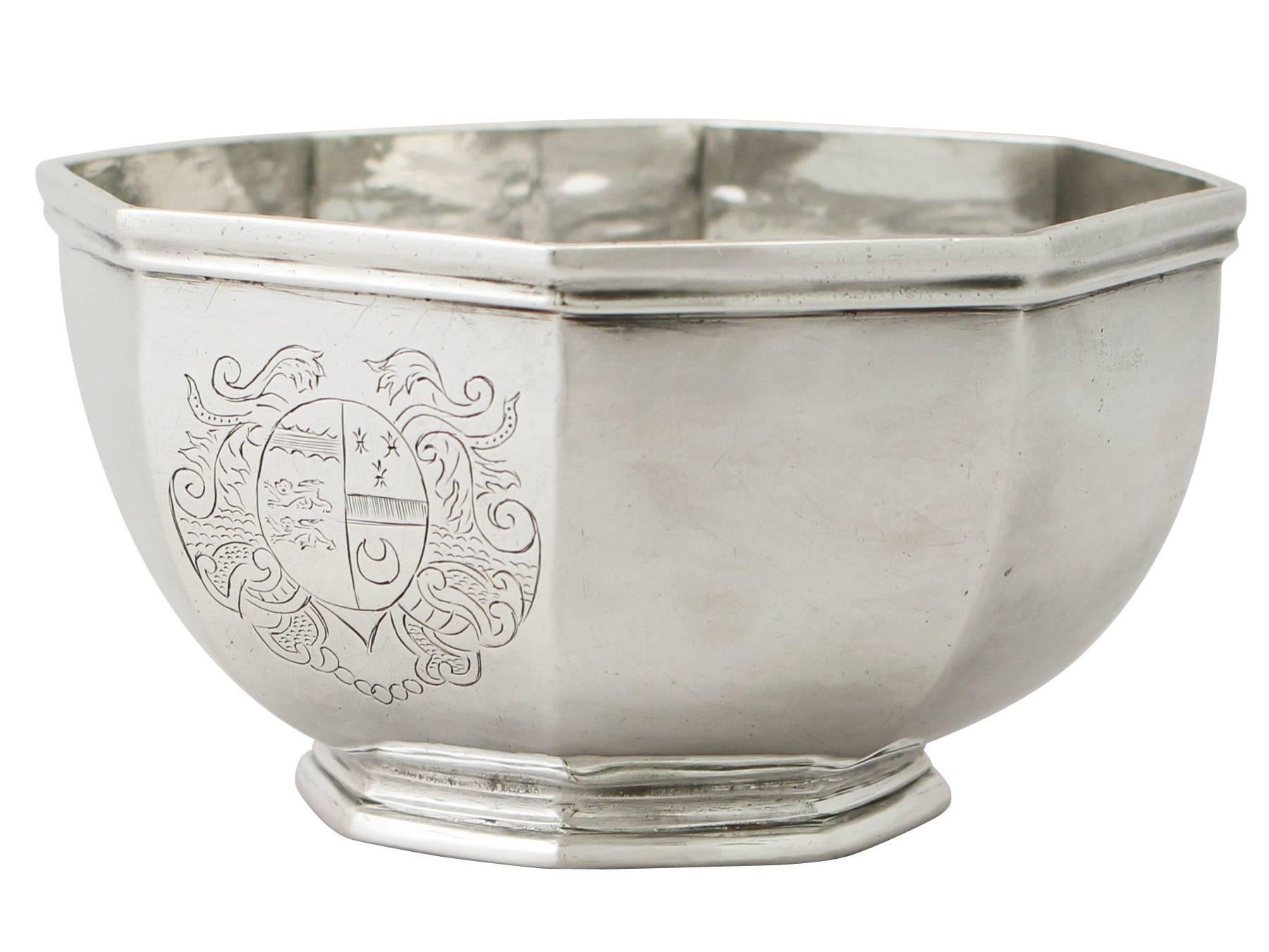 An exceptional, fine and impressive antique Queen Anne English Britannia standard silver bowl made by James Rood; an addition to our 18th century silverware collection.

This exceptional antique Queen Anne Britannia standard silver* bowl has a