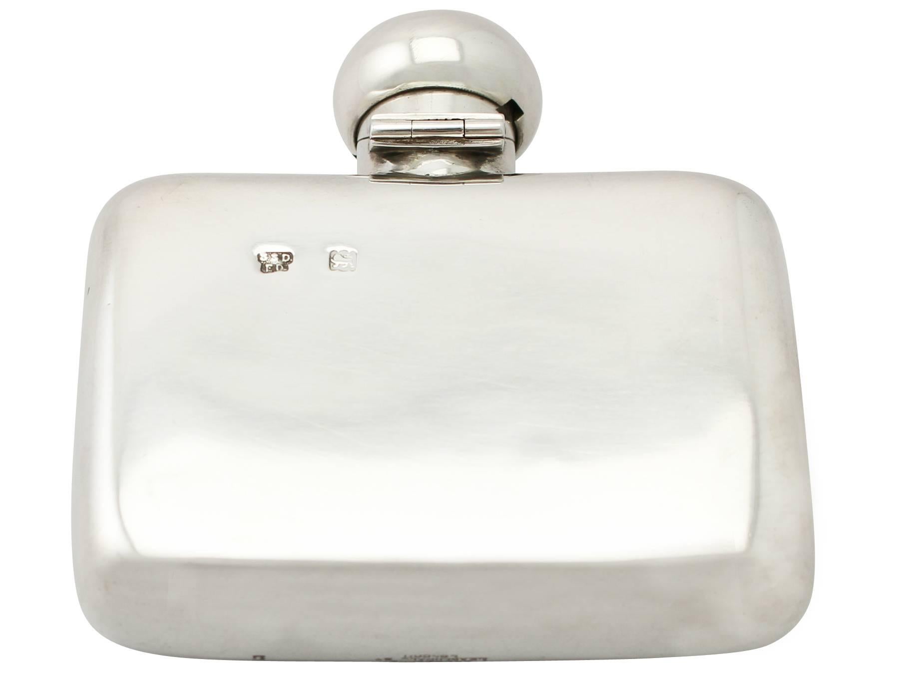 An exceptional, fine and impressive antique Victorian English sterling silver hip flask; part of our wine and drinks related silverware collection.

This exceptional antique Victorian sterling silver hip flask has a rectangular form with rounded