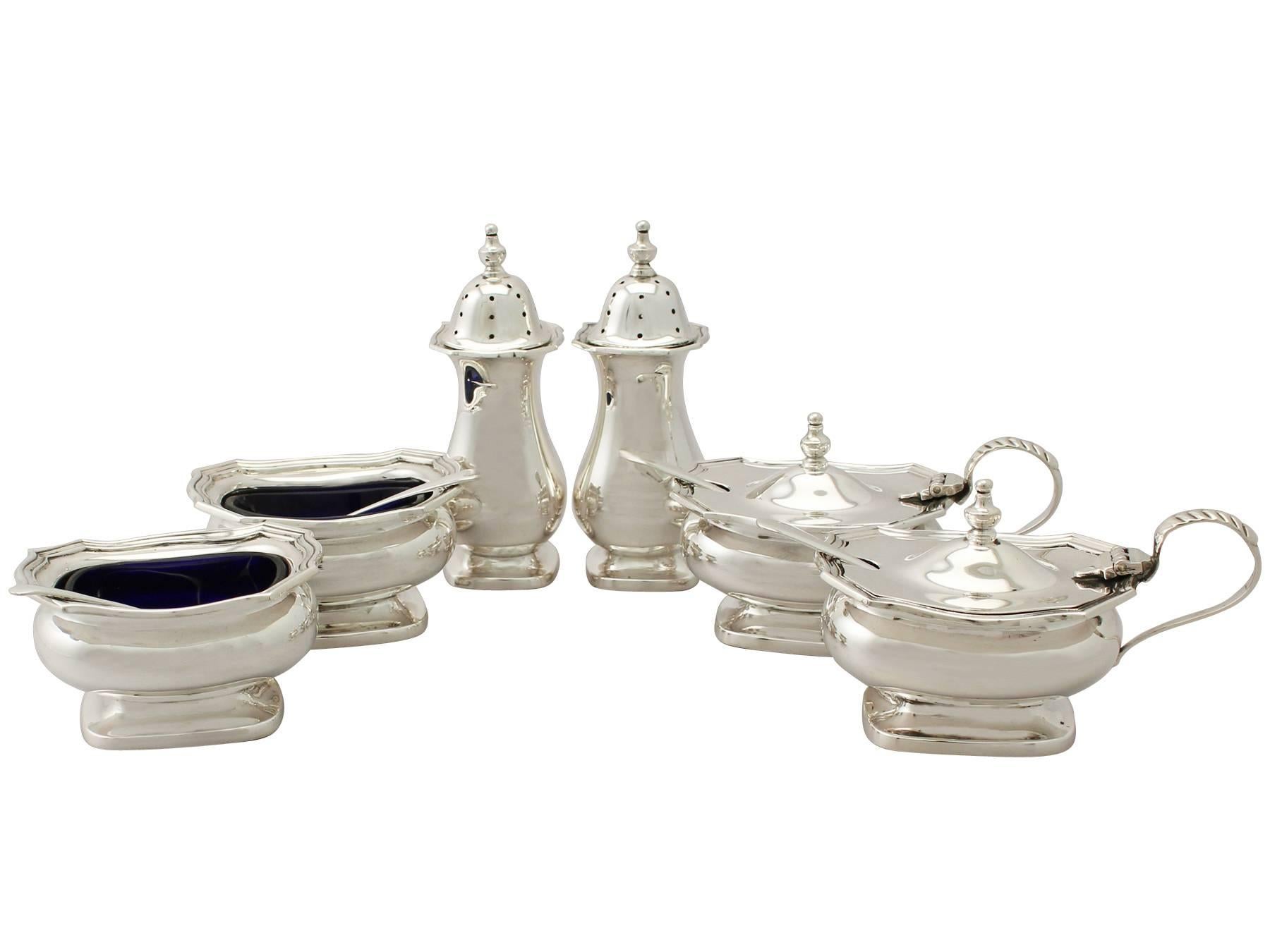 An exceptional, fine and impressive vintage Elizabeth II English sterling silver six piece condiment set - boxed; an addition to our dining silverware collection.

This exceptional vintage Elizabeth II sterling silver six piece condiment set