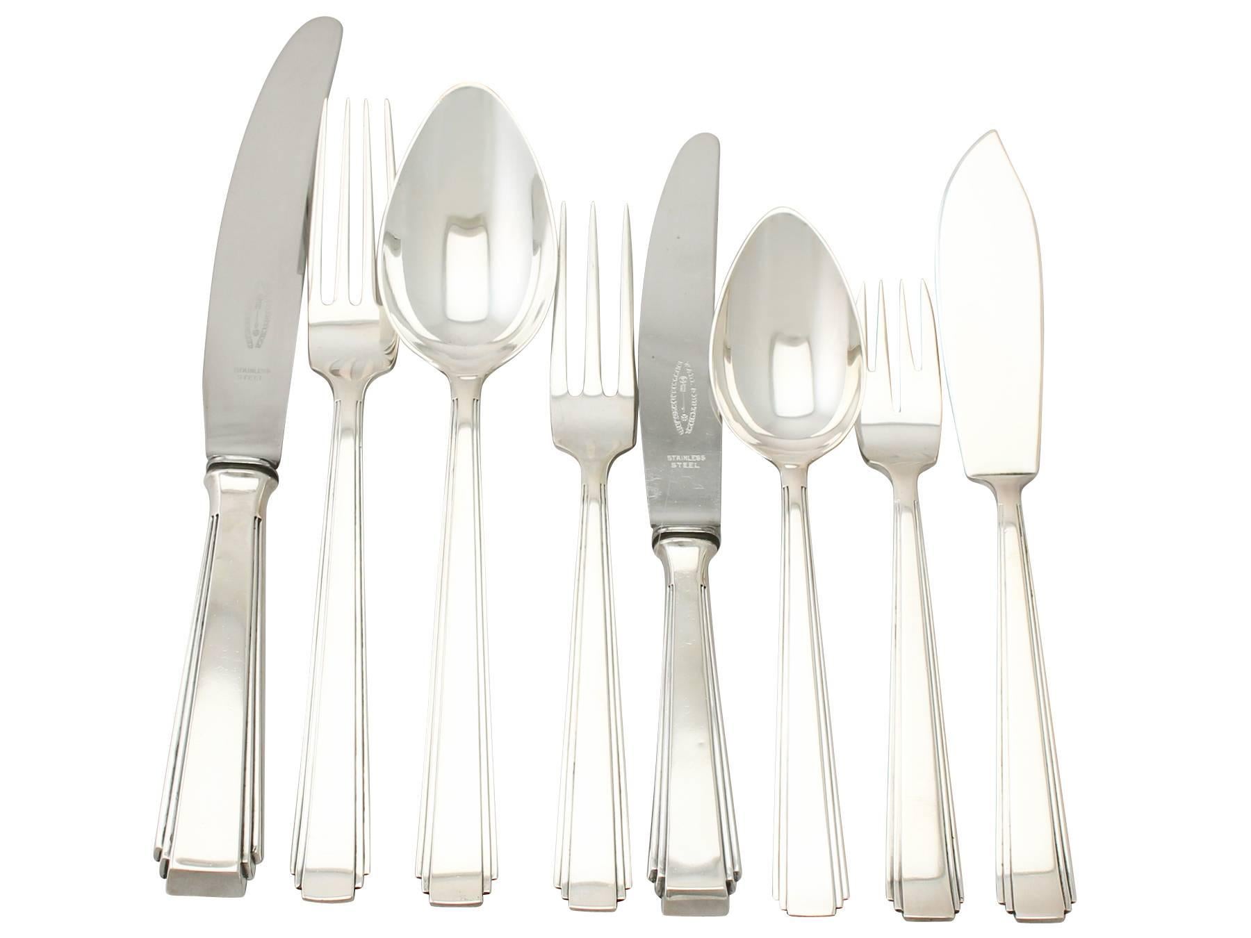 An exceptional, fine and impressive antique Dutch silver straight flatware service for 12 persons in the Art Deco style; an addition to our canteen of cutlery collection.

The pieces of this exceptional antique Dutch silver straight* flatware set