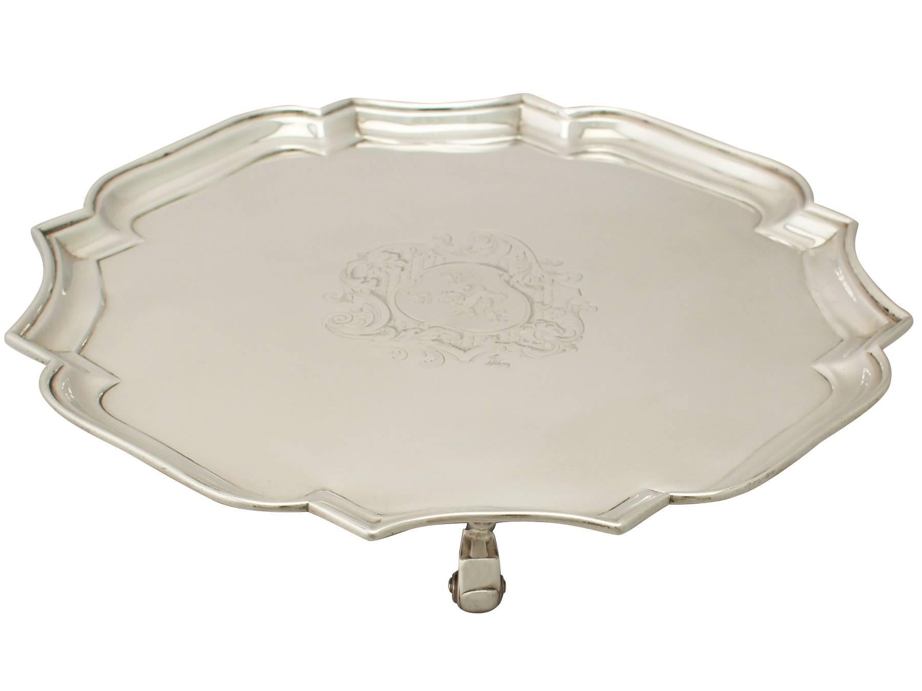 An exceptional, fine and impressive antique Georgian English sterling silver salver made by John Tuite; an addition to our dining silverware collection.

This exceptional antique George II sterling silver salver has a plain octagonal shaped