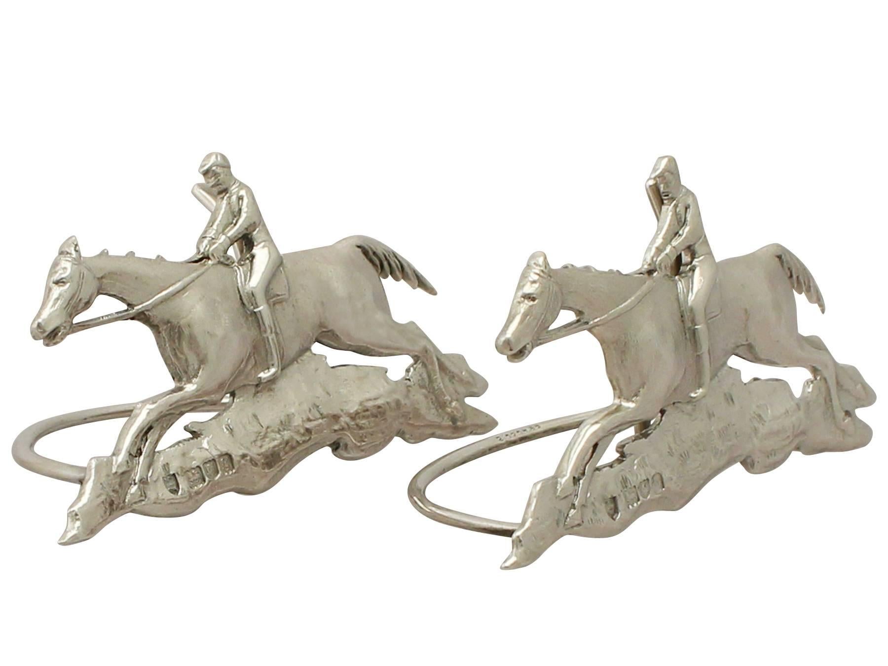 An exceptional, fine and impressive pair of antique Edwardian English cast sterling silver card/menu holders; an addition to our equestrian silverware collection.

These exceptional Edwardian cast sterling silver menu holders have been