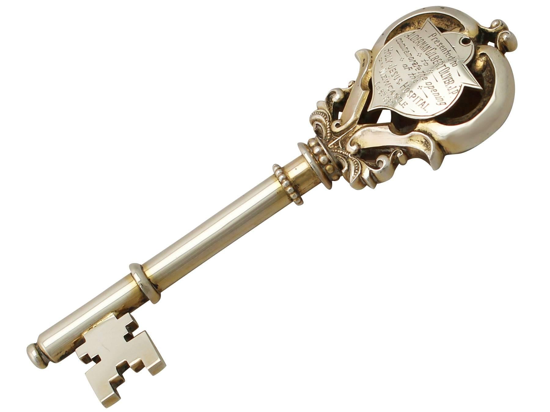 An exceptional, fine and impressive antique George V English sterling silver ceremonial/presentation key; an addition to our ornamental presentation collection.

This exceptional antique George V sterling silver presentation key has a rounded