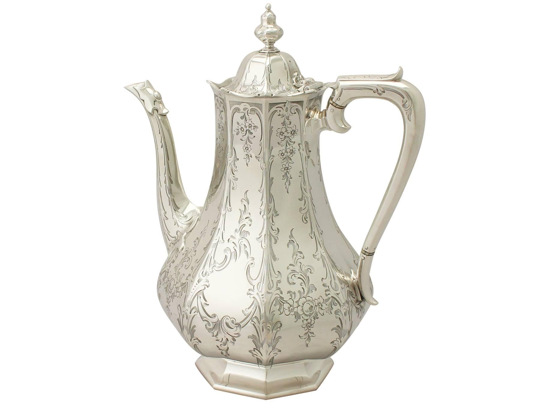 A fine and impressive antique Victorian English sterling silver coffee pot made by Edward & John Barnard; an addition to our diverse silver teaware collection.

This fine antique Victorian sterling silver coffee pot has a panelled baluster shaped