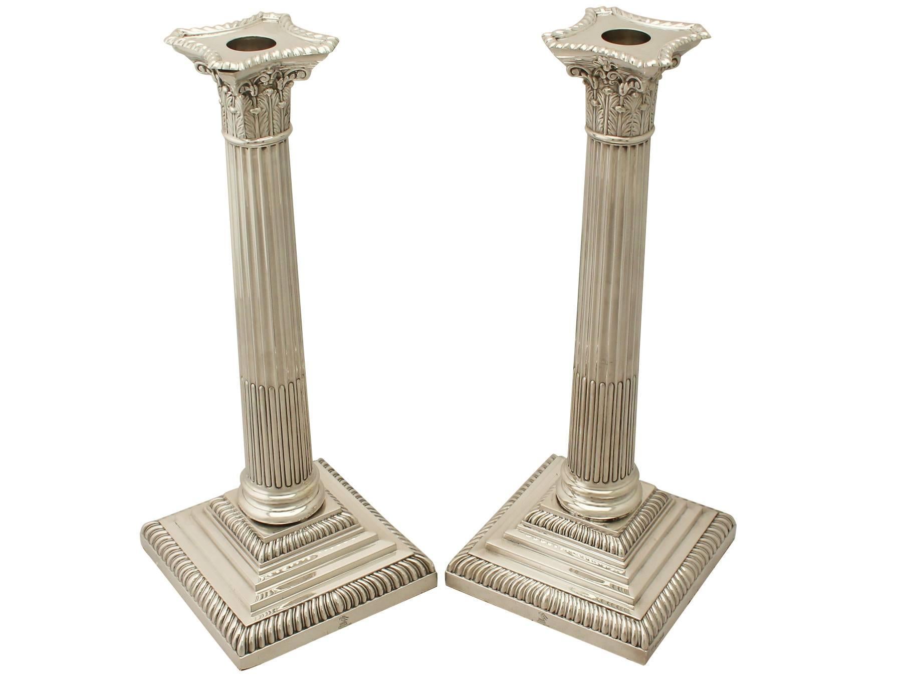 A magnificent, fine and impressive, large pair of antique George V English sterling silver Corinthian column candlesticks; part of our ornamental silverware collection.

Description

These exceptional antique George V sterling silver