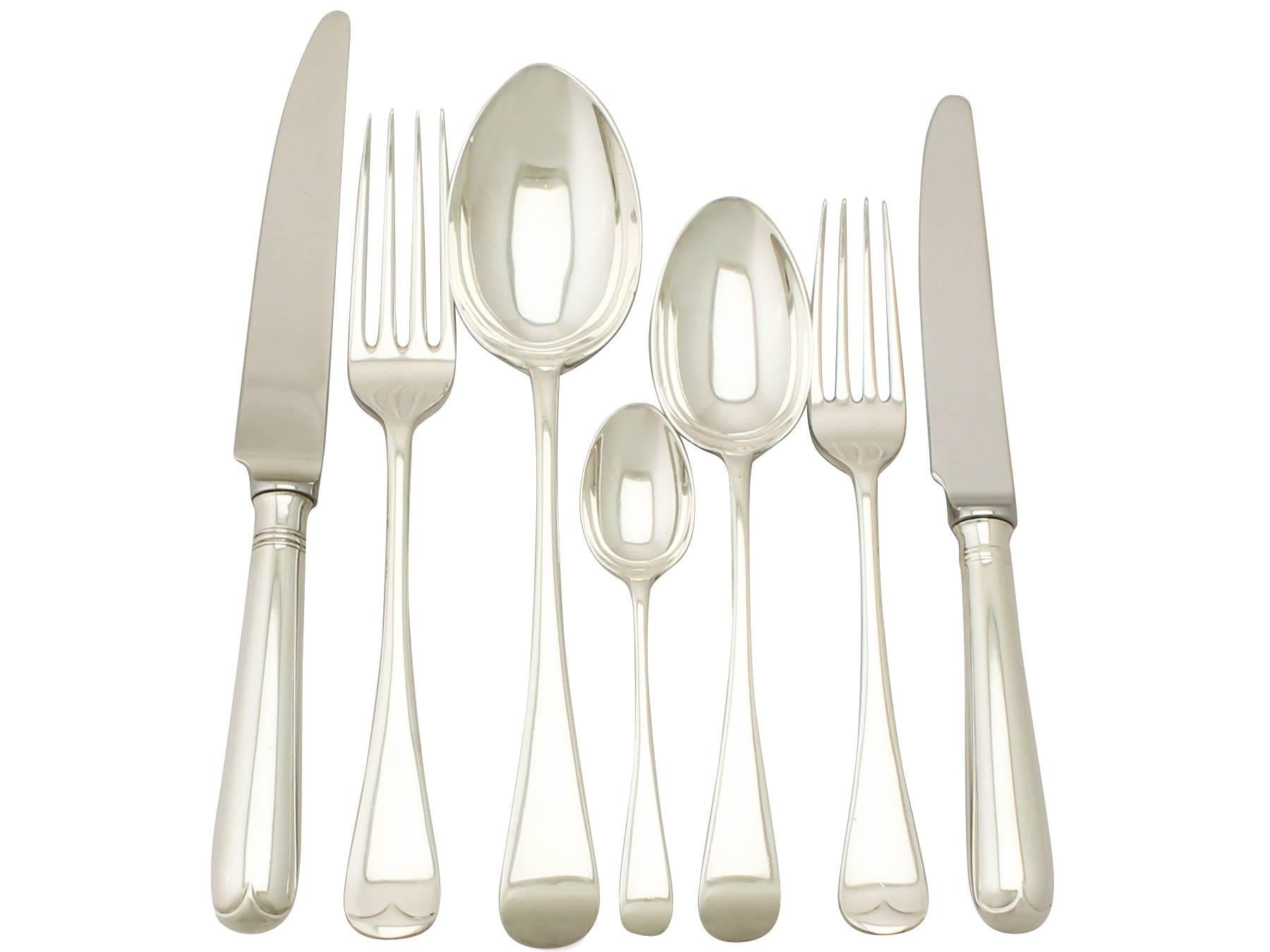 An exceptional, fine and impressive, antique George V English sterling silver straight Old English pattern flatware service for six persons; an addition to our antique silver flatware collection.

The pieces of this exceptional, straight* sterling