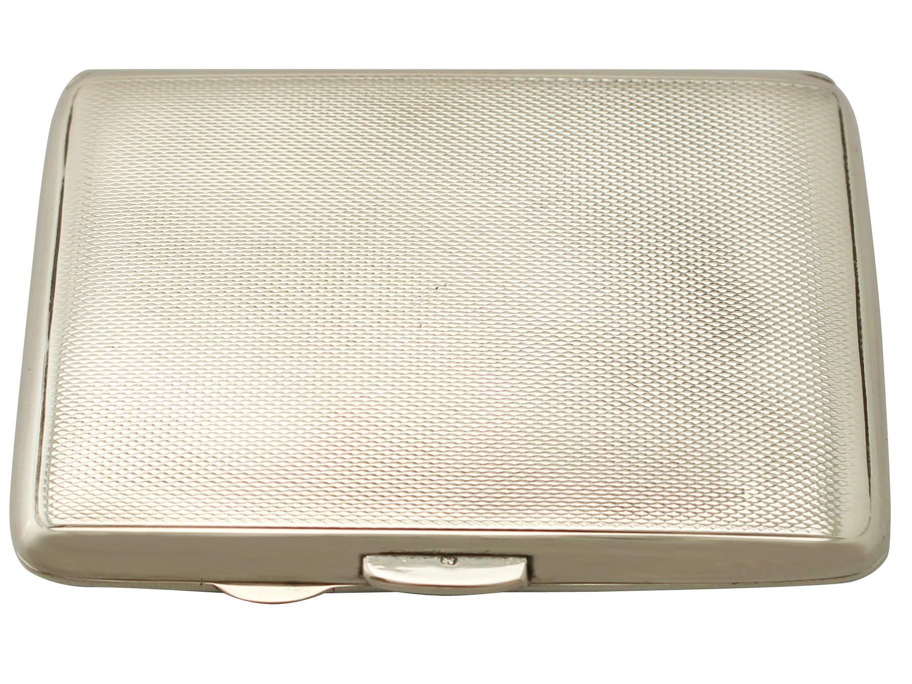 An exceptional, fine and impressive antique Edward VIII English sterling silver and enamel cigarette case; an addition to our silver smoking related silverware collection.

This exceptional antique Edwardian sterling silver cigarette case has a