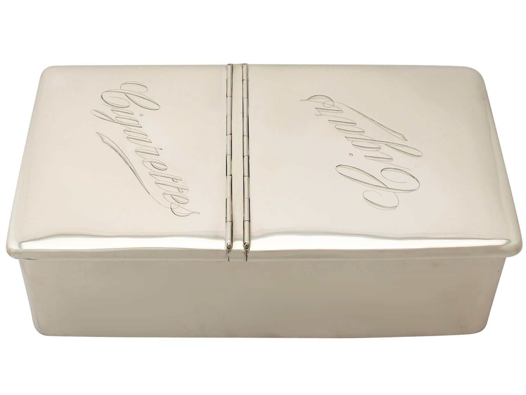 An exceptional, fine and impressive antique Edwardian English sterling silver cigarette/cigar box - boxed; an addition to the ornamental silverware collection.

This exceptional antique Edwardian sterling silver cigarette box has a plain rectangular