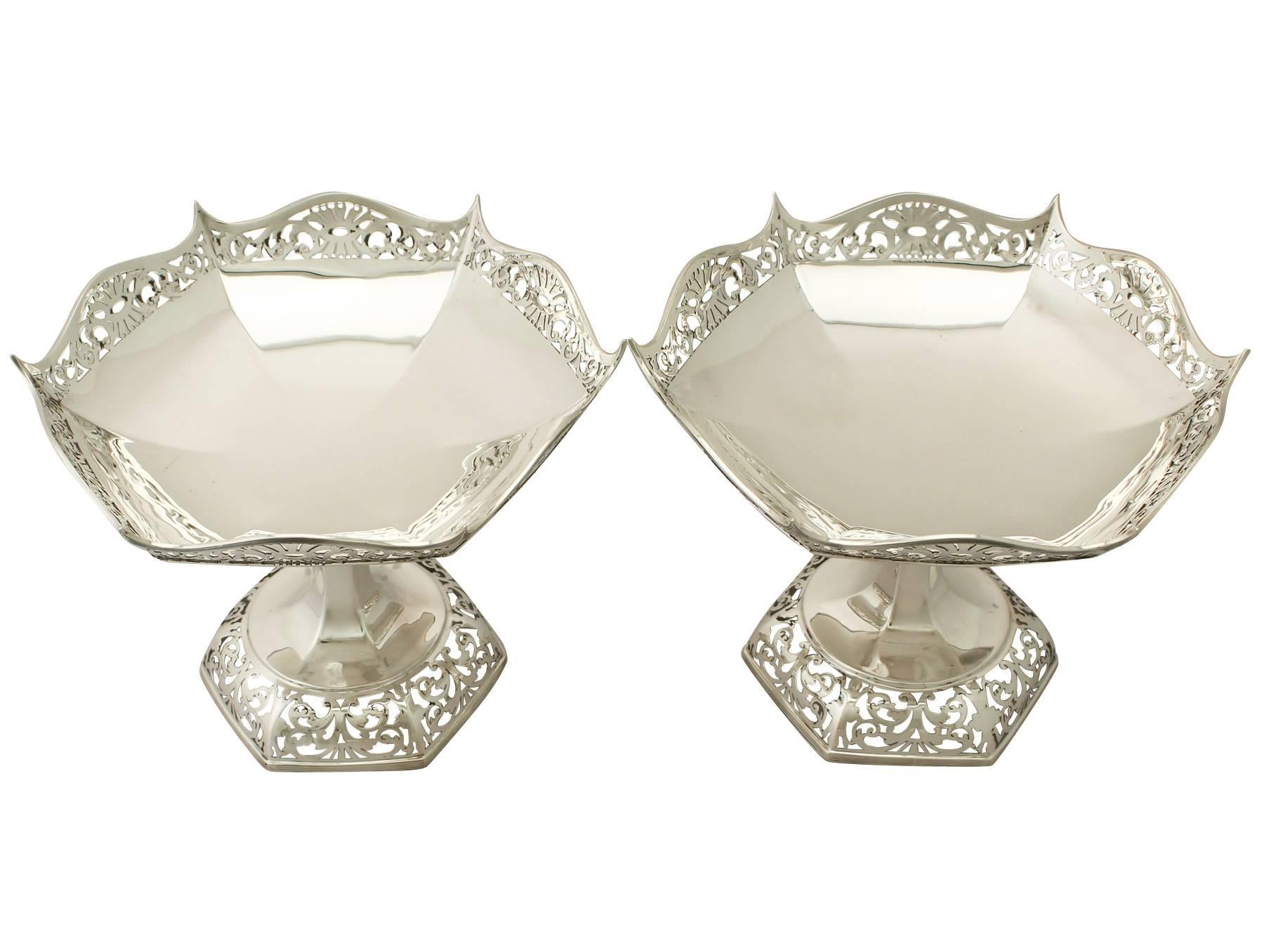 A fine and impressive pair of antique Edwardian English sterling silver tazza; an addition to our ornamental silverware collection.

These exceptional antique Edwardian sterling silver tazzas have a hexagonal rounded form.

The body of each