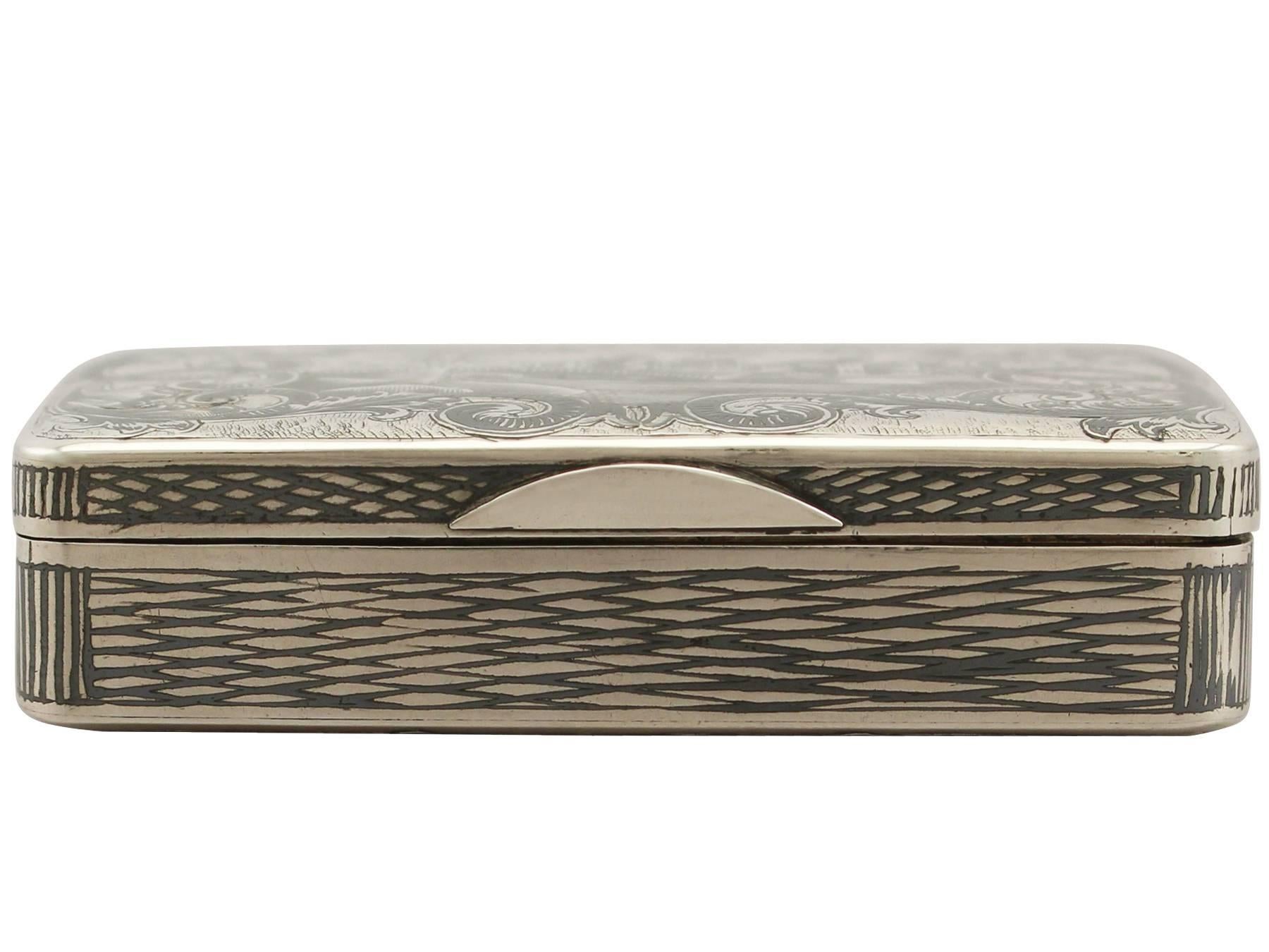 An exceptional, fine and impressive antique Russian silver and niello enamel box; an addition to our Russian silverware collection.

This exceptional antique Russian silver box has a rectangular form with rounded corners.

The sides of the