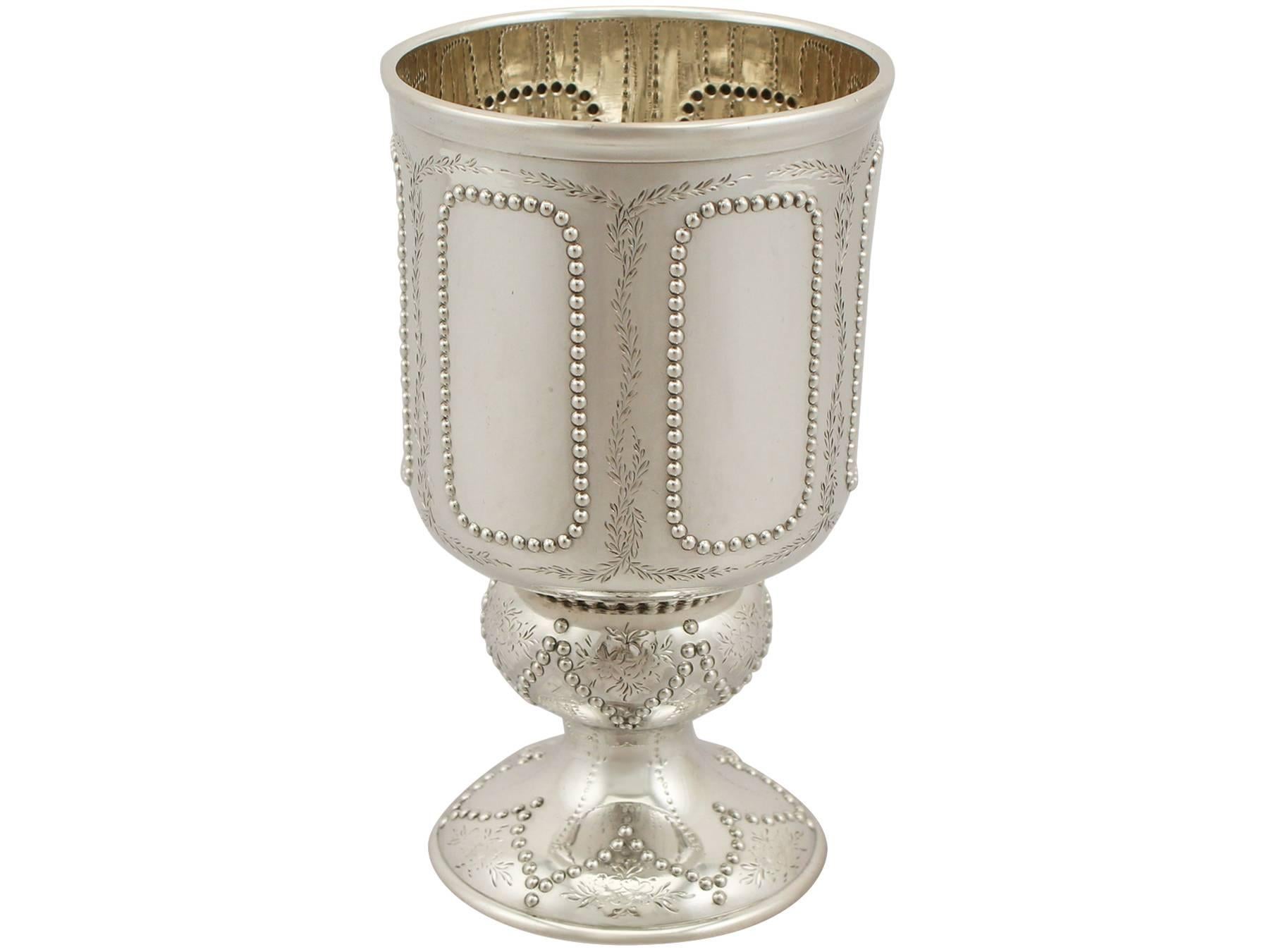 An exceptional, fine and impressive antique Victorian English sterling silver goblet in the Arts and Crafts style; an addition to our wine and drinks related silverware collection.

This exceptional antique Victorian sterling silver goblet has a