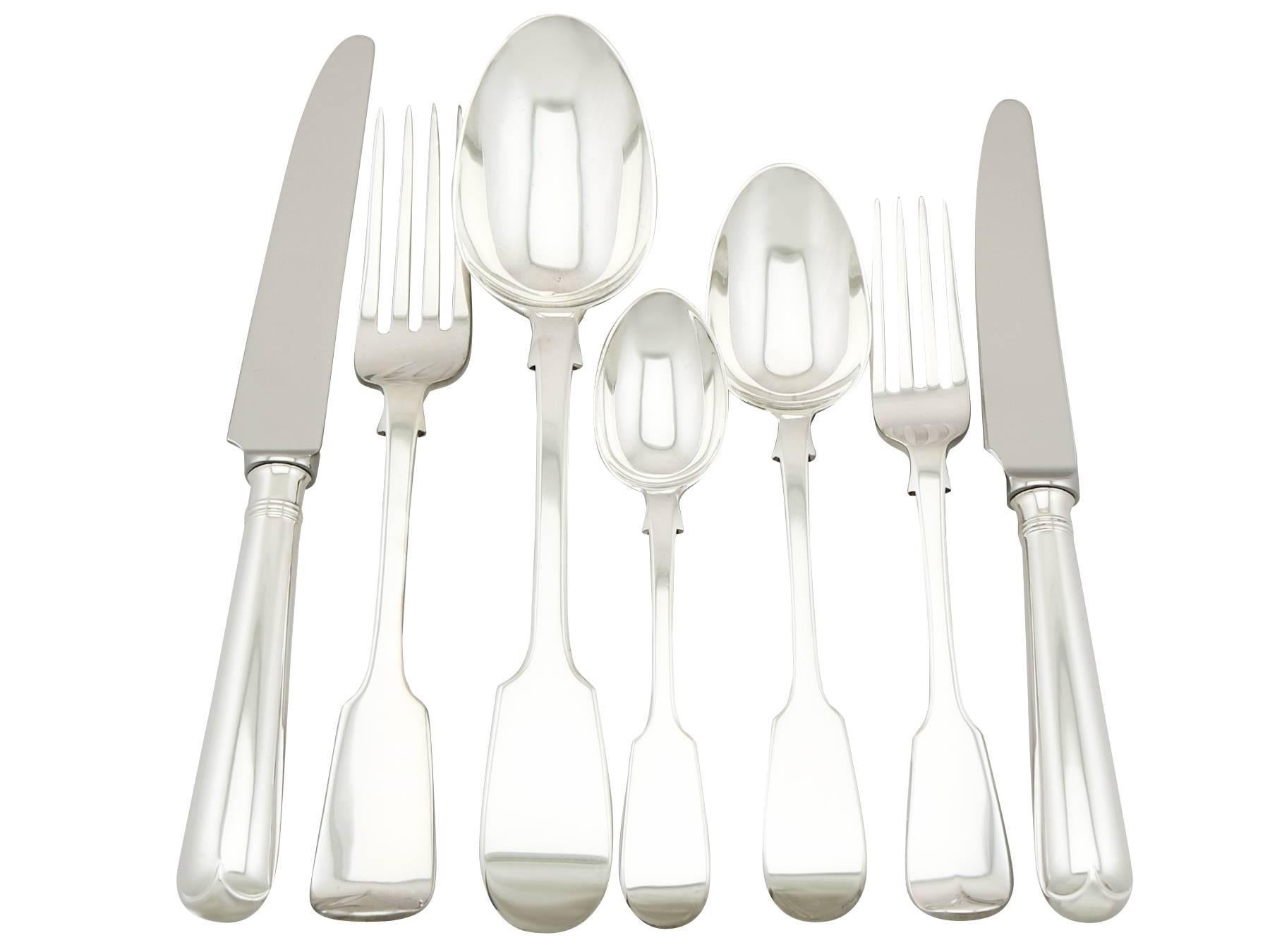 An exceptional, fine and impressive, composite antique Victorian English sterling silver straight Fiddle pattern flatware service for twelve persons, made by George Adams; an addition to our canteen of cutlery collection

The pieces of this