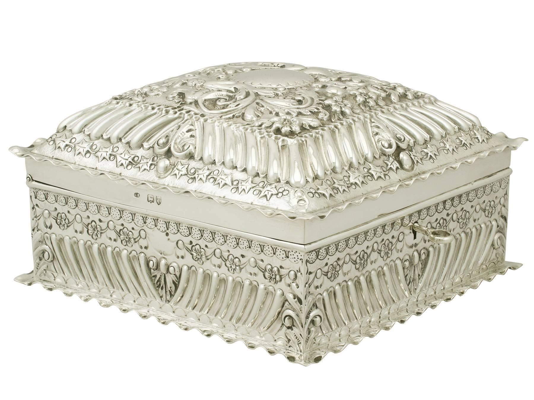 An exceptional, fine and impressive antique Victorian English sterling silver jewelry box; an addition to the ornamental silverware collection.

This exceptional antique Victorian locking jewelry box in sterling silver has a square shaped