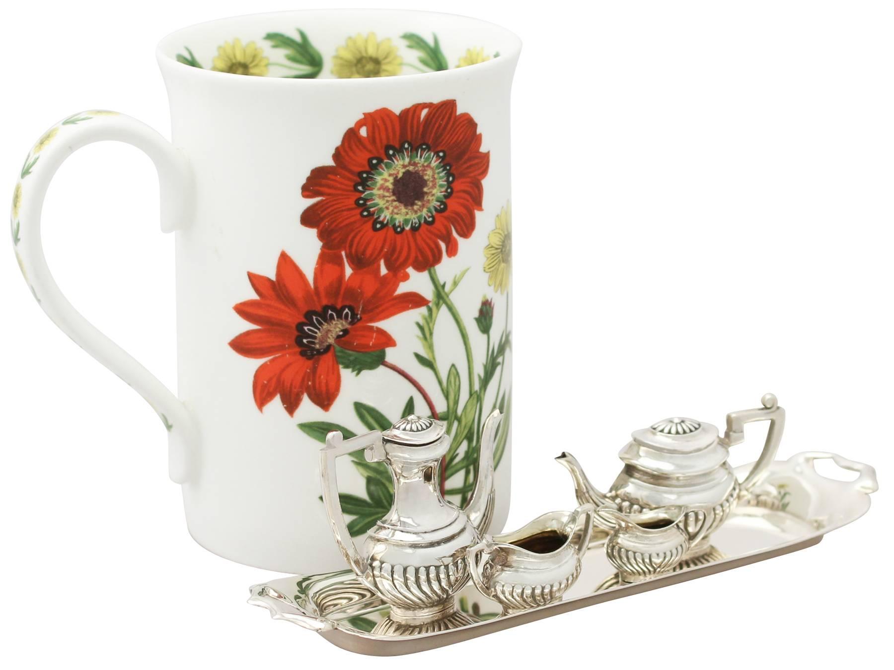 miniature silver tea set