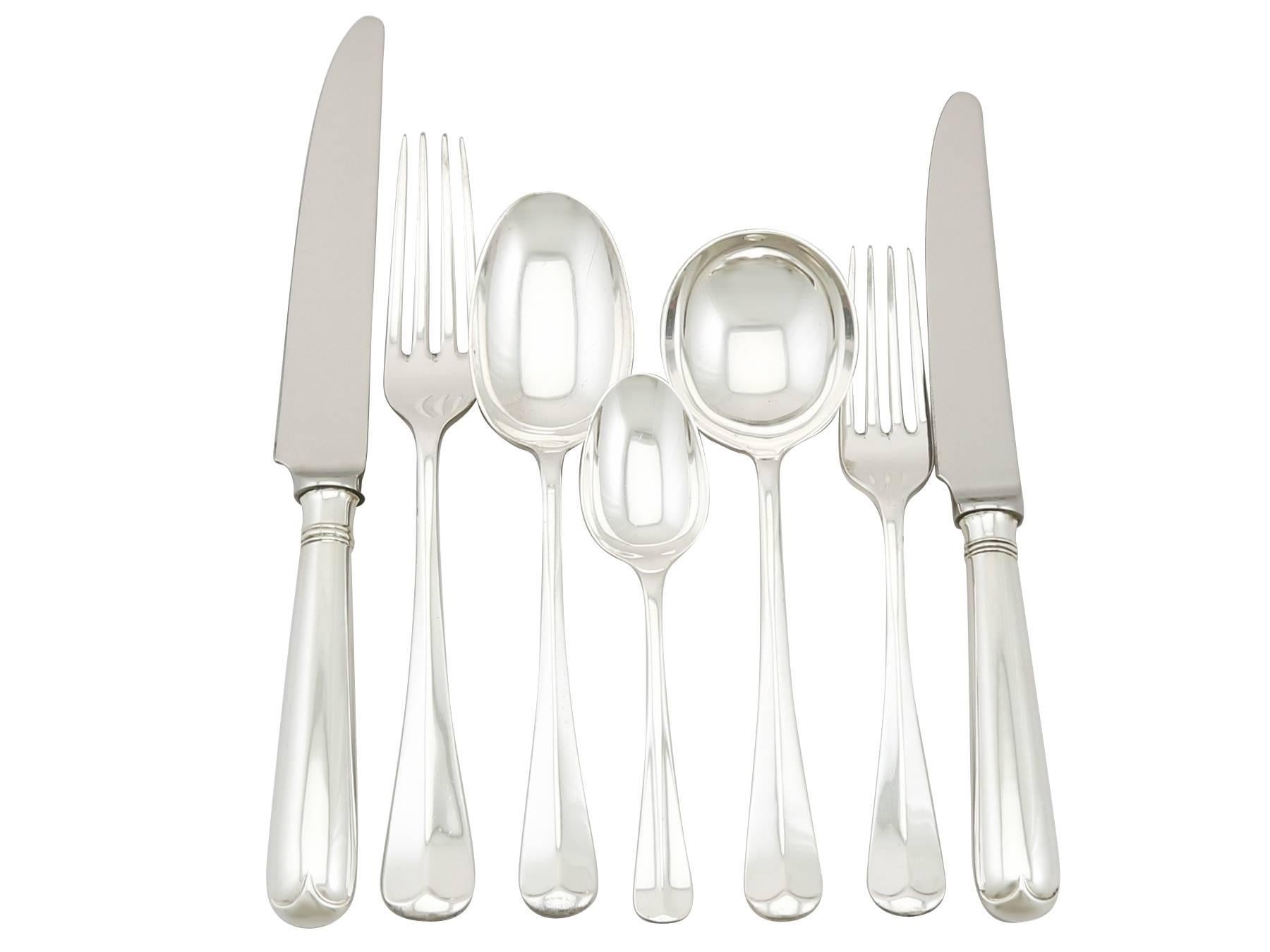 An exceptional, fine and impressive vintage George VI English sterling silver straight Hanoverian Rat Tail pattern canteen of cutlery for twelve persons; an addition to our antique flatware sets.

The pieces of this exceptional vintage George VI