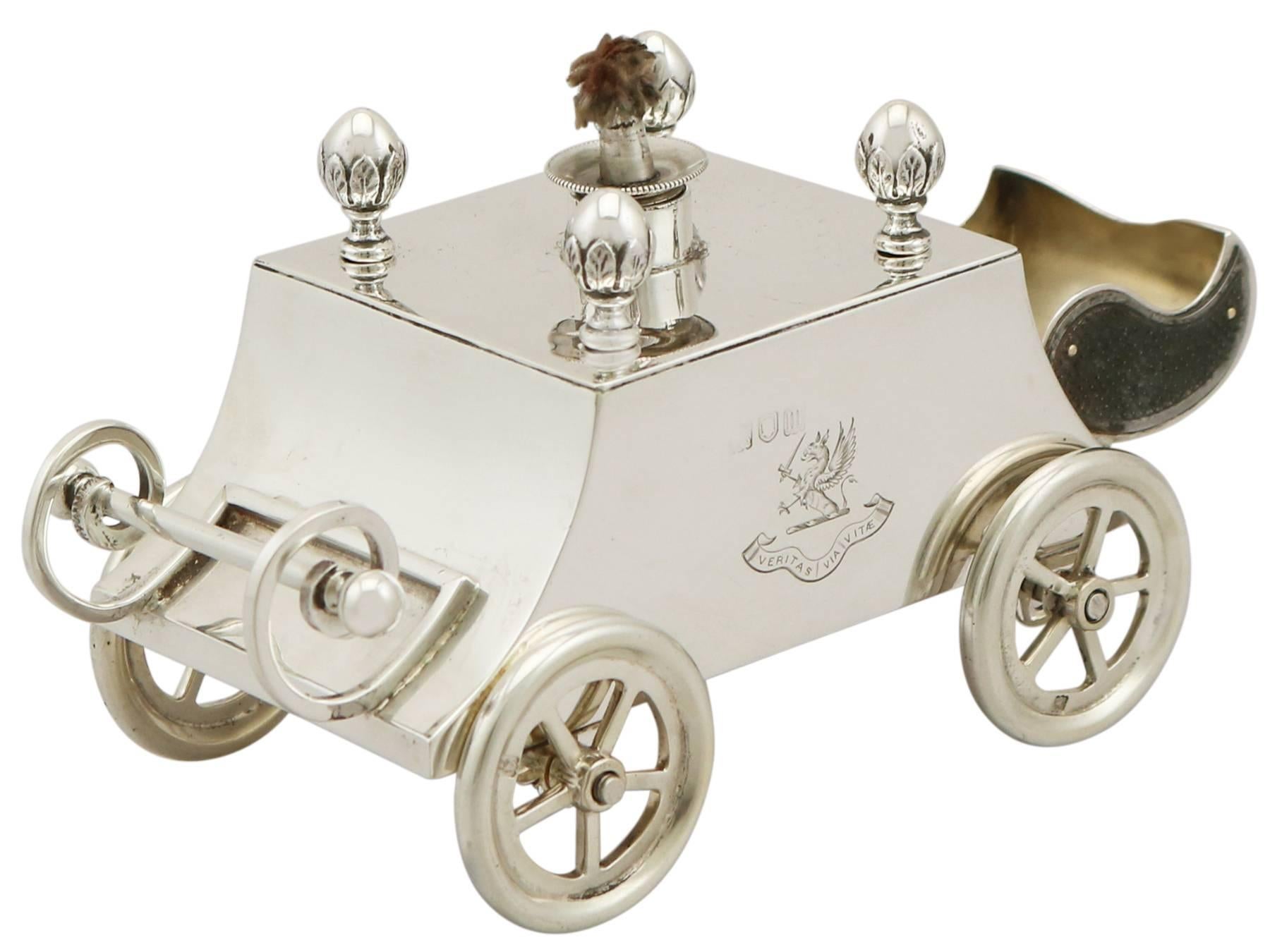 An exceptional, fine, impressive and unusual antique Edwardian English sterling silver table lighter modelled in the form of a 'carriage'; an addition to our maritime silverware collection.

This exceptional antique Edwardian sterling silver table