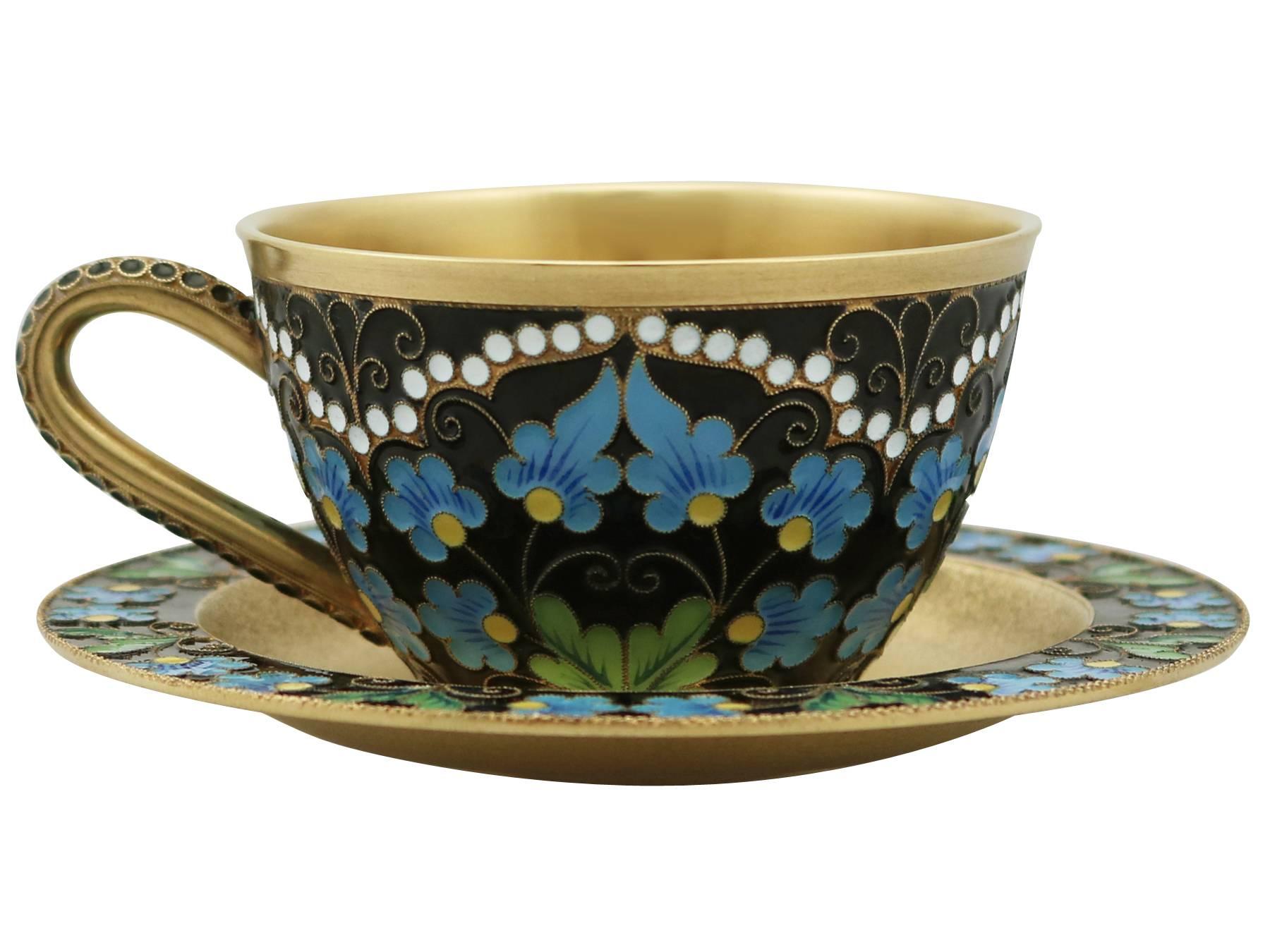 An exceptional, fine and impressive vintage Russian silver and polychrome cloisonné enamel tea cups and saucers set; an addition to our range of drinks related silverware.

These exceptional vintage Russian silver gilt tea cups and saucers have a
