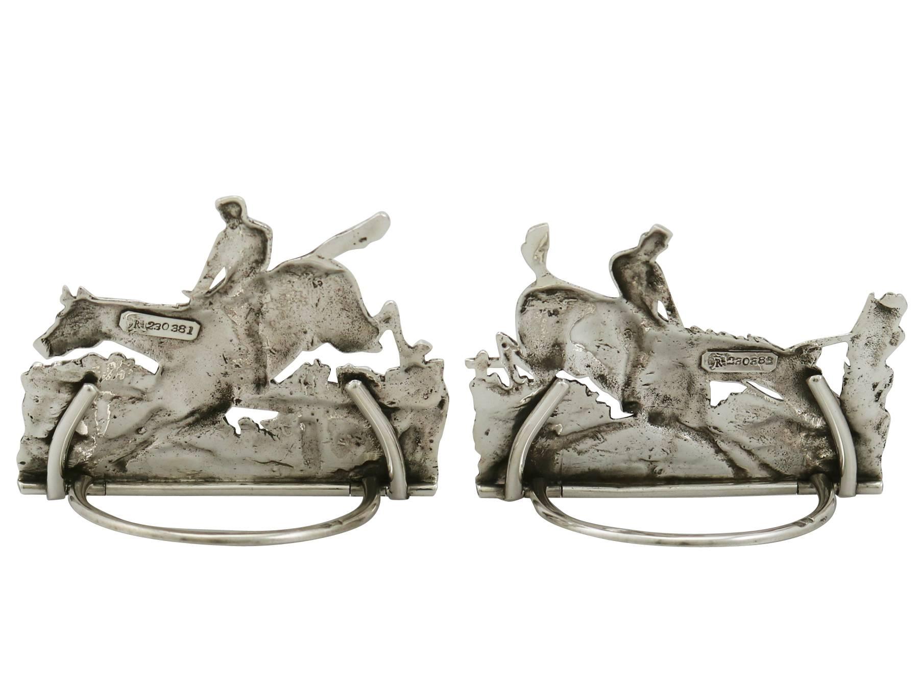 An exceptional, fine and impressive pair of antique Victorian English cast sterling silver card/menu holders; an addition to animal related silverware collection.

These exceptional Victorian cast sterling silver menu holders have been