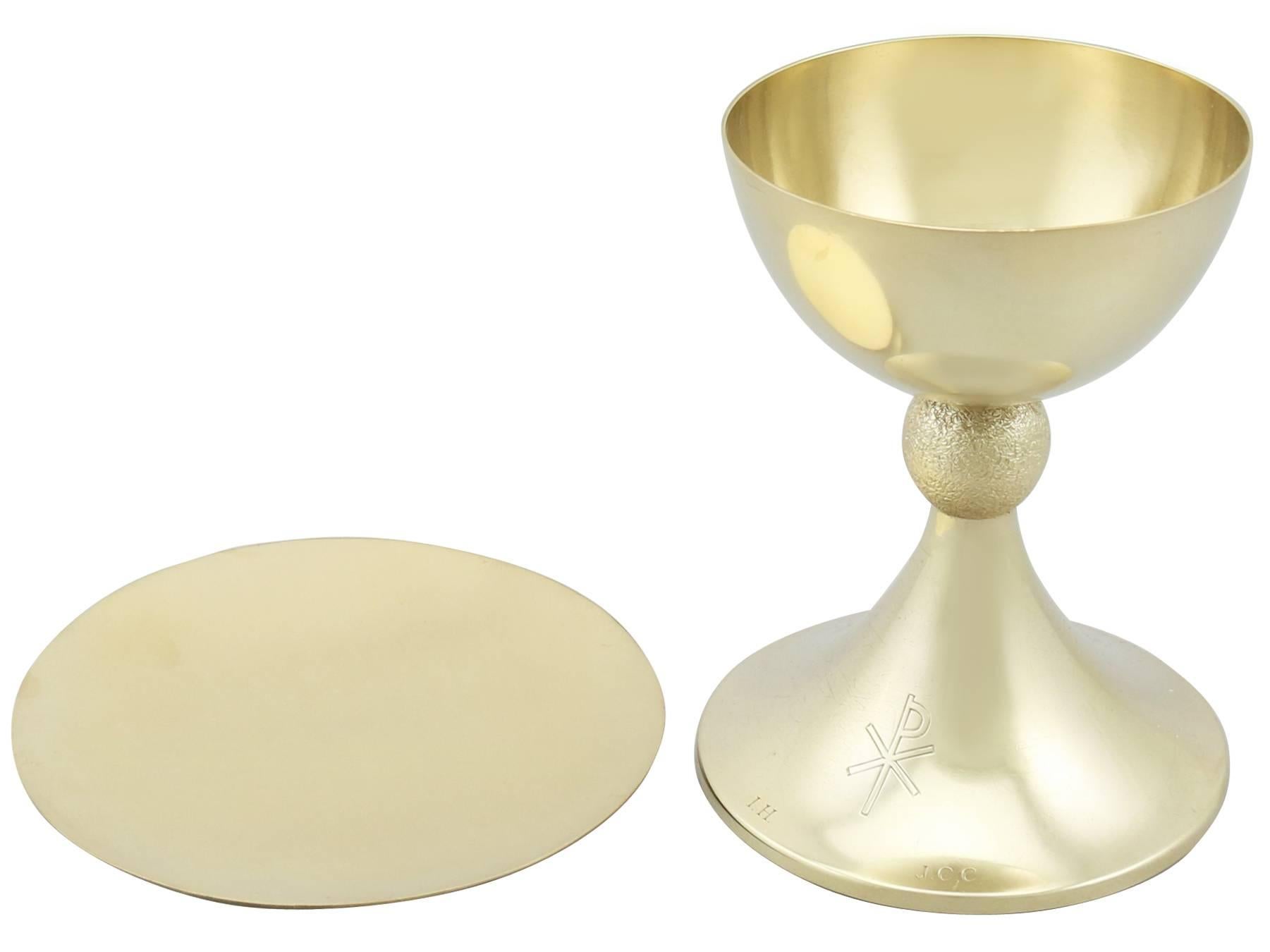 An exceptional, fine and impressive vintage English sterling silver gilt communion set made by A E Jones; an addition to our diverse religious silverware collection.

This exceptional vintage Elizabeth II sterling silver gilt communion set