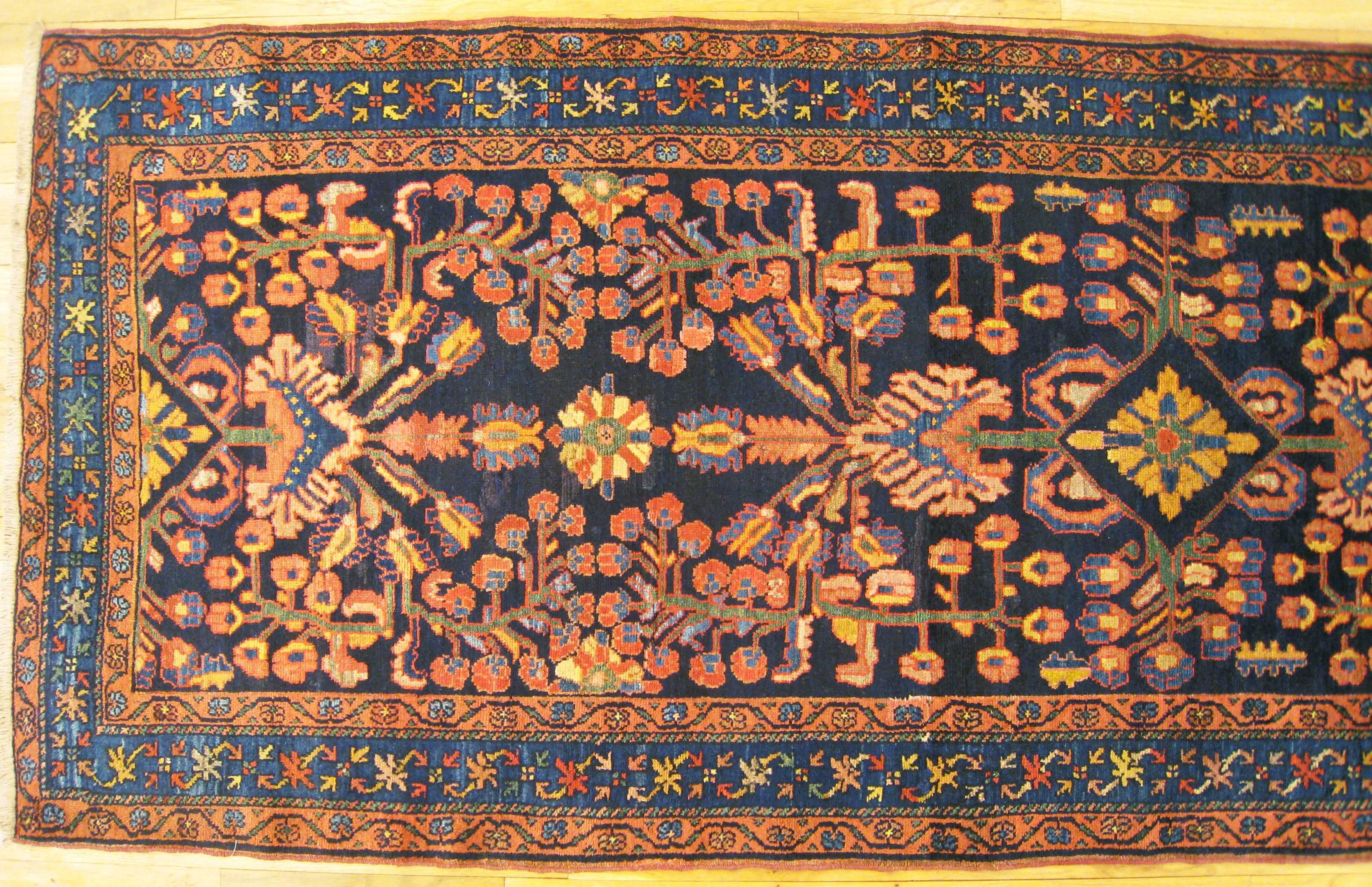 Hand-Woven Antique Persian Hamadan Runner with Floral Design and Jewel Tones, circa 1920