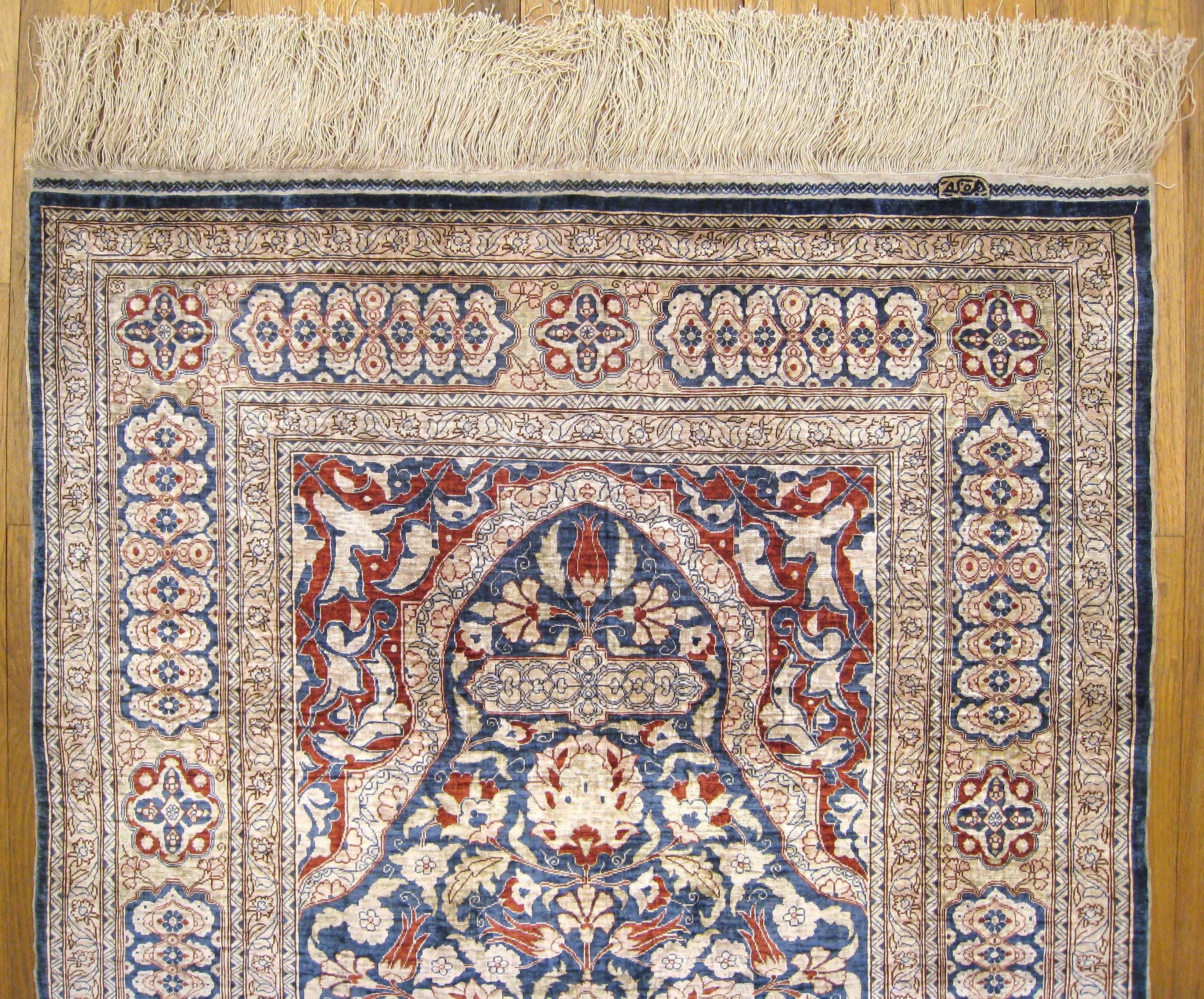 hereke silk rugs