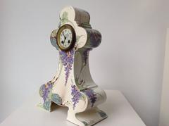 Art Nouveau clock, ceramic with a floral design, Gouda