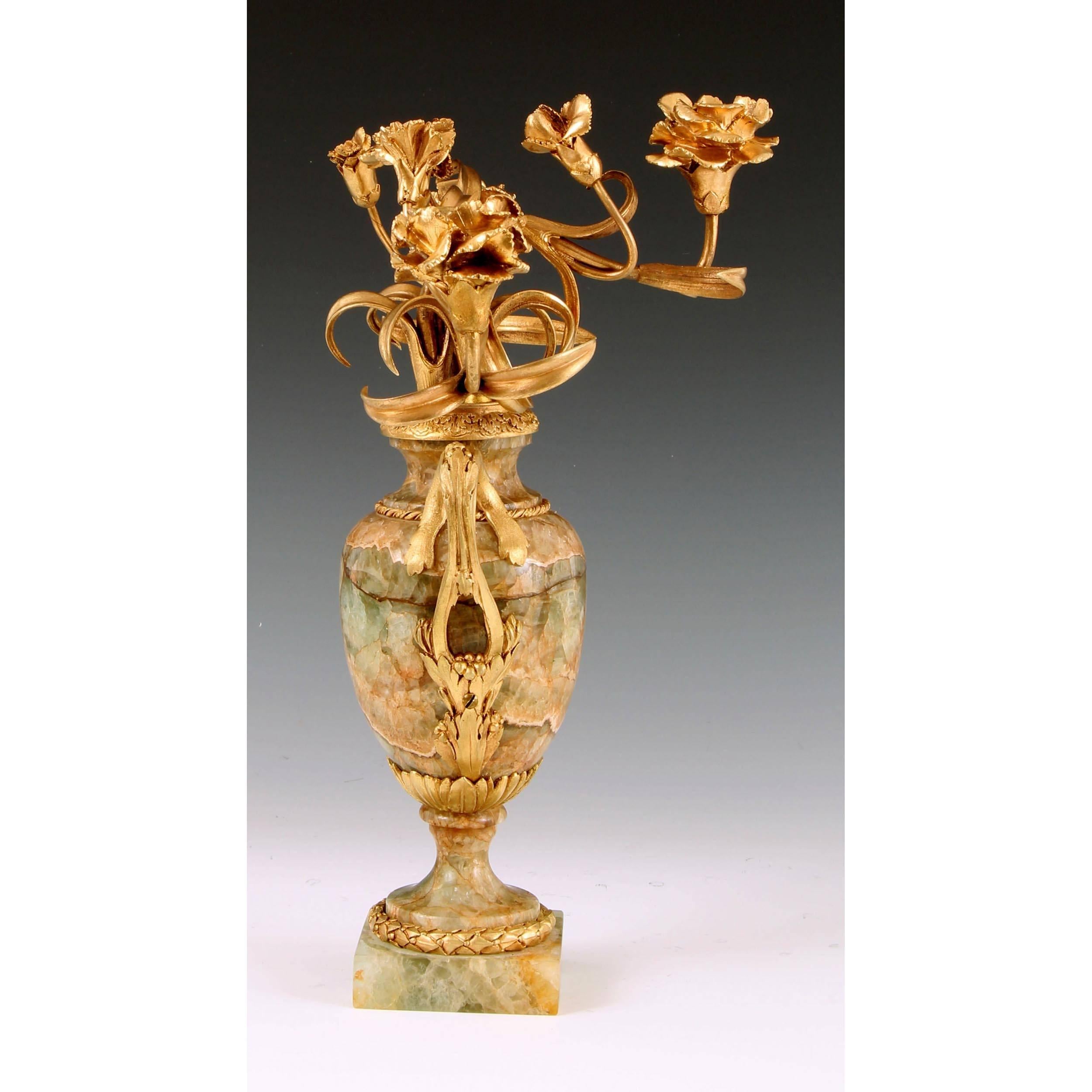 A very fine late 18th century neoclassical Louis XVI Weardale Fluorspar and ormolu candelabra, the vase of classical baluster form, raised on a stepped base and supporting naturalistic branches of foliage and flowers. 

Weardale Fluorspar is the
