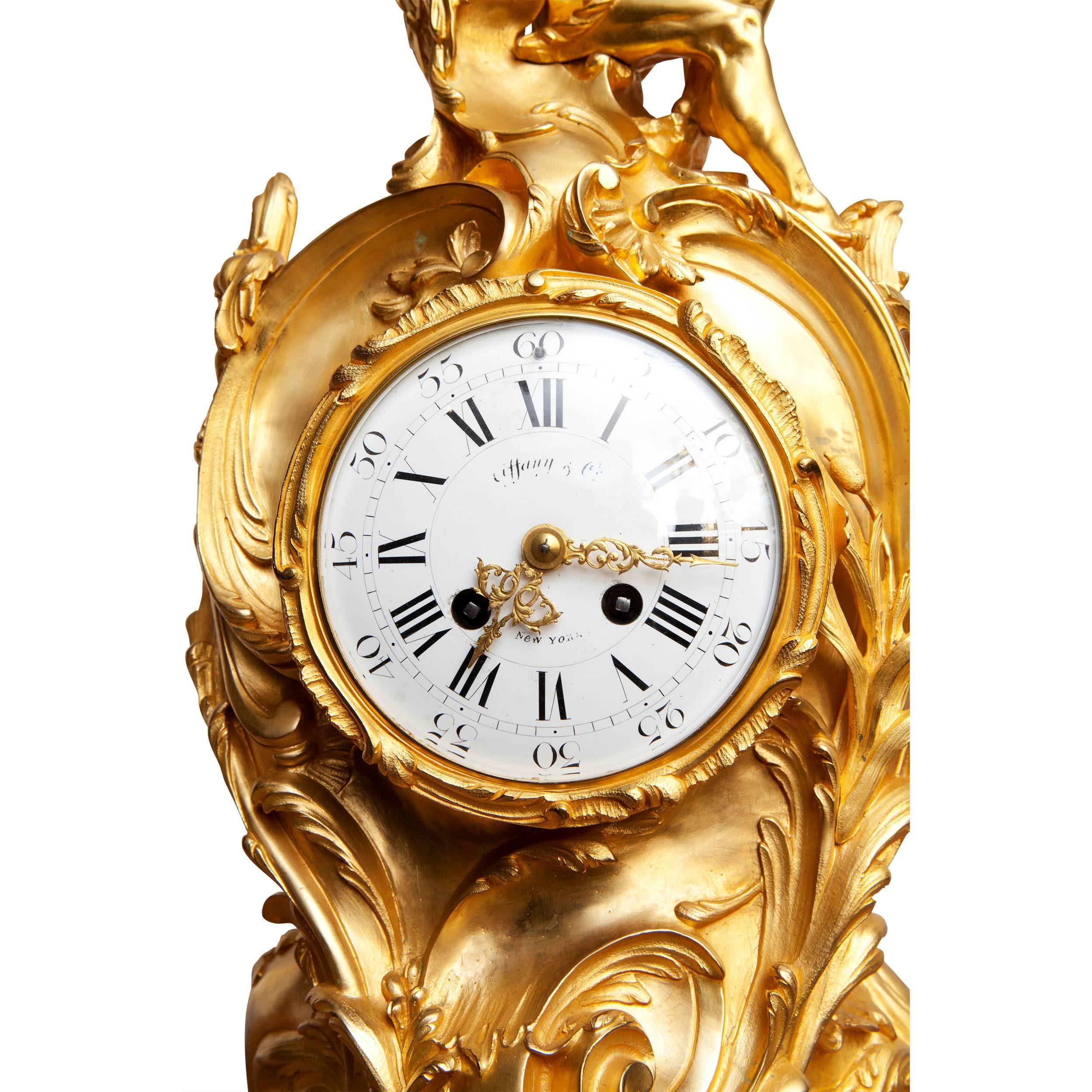 France, circa 1870-1880.

The porcelain dial signed Tiffany & Co and stamped Tiffany on movement. The fine mercury gilt bronze case standing on four scrolled feet with reeds culminating with Father Time holding a sceptre and sitting above the