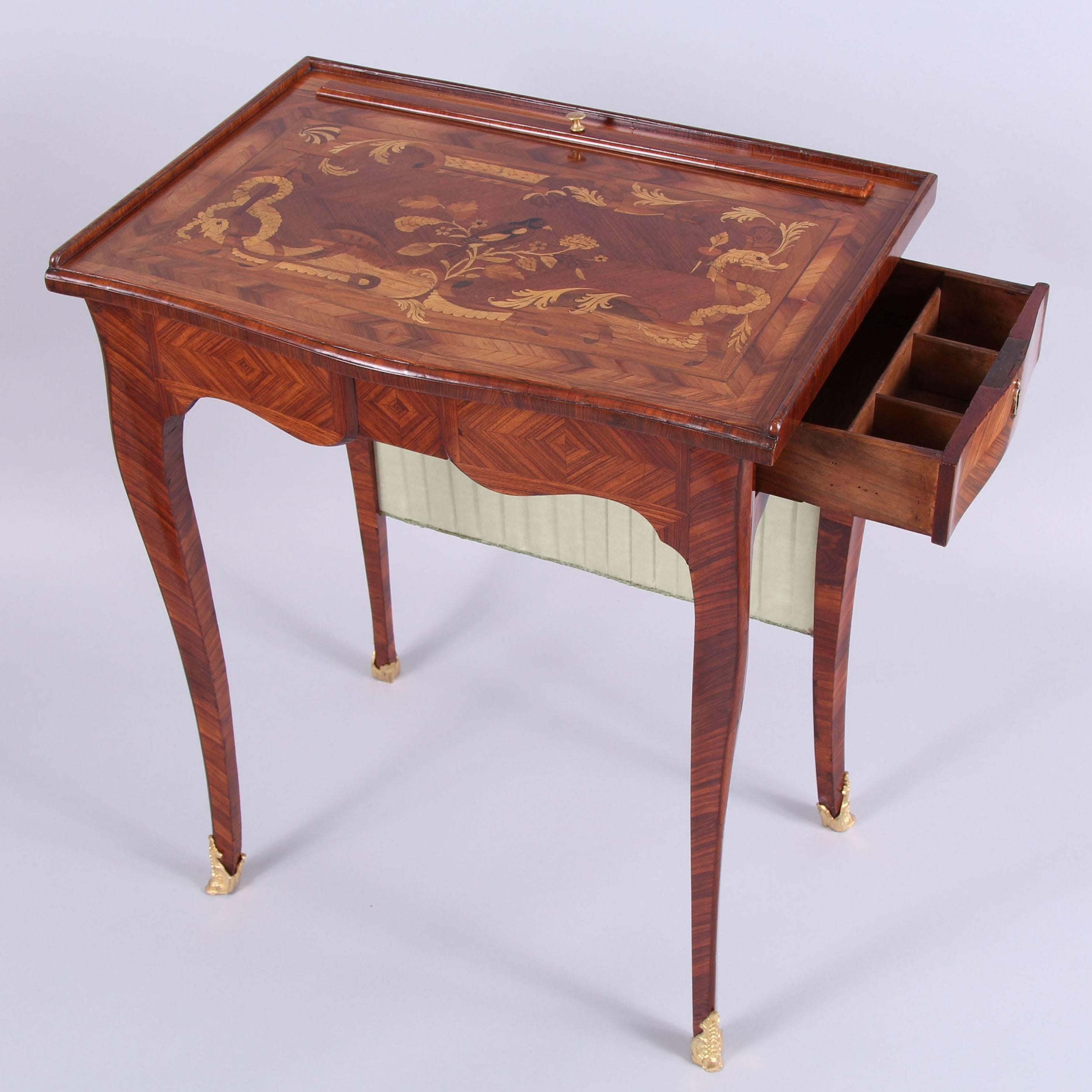 France, circa 1770.

The rarity of this piece cannot be overstated, the marquetry design, including entwined serpents and a central song bird are a supreme example of Boudin's eye for detail and perfection in execution. Stamped on the underneath