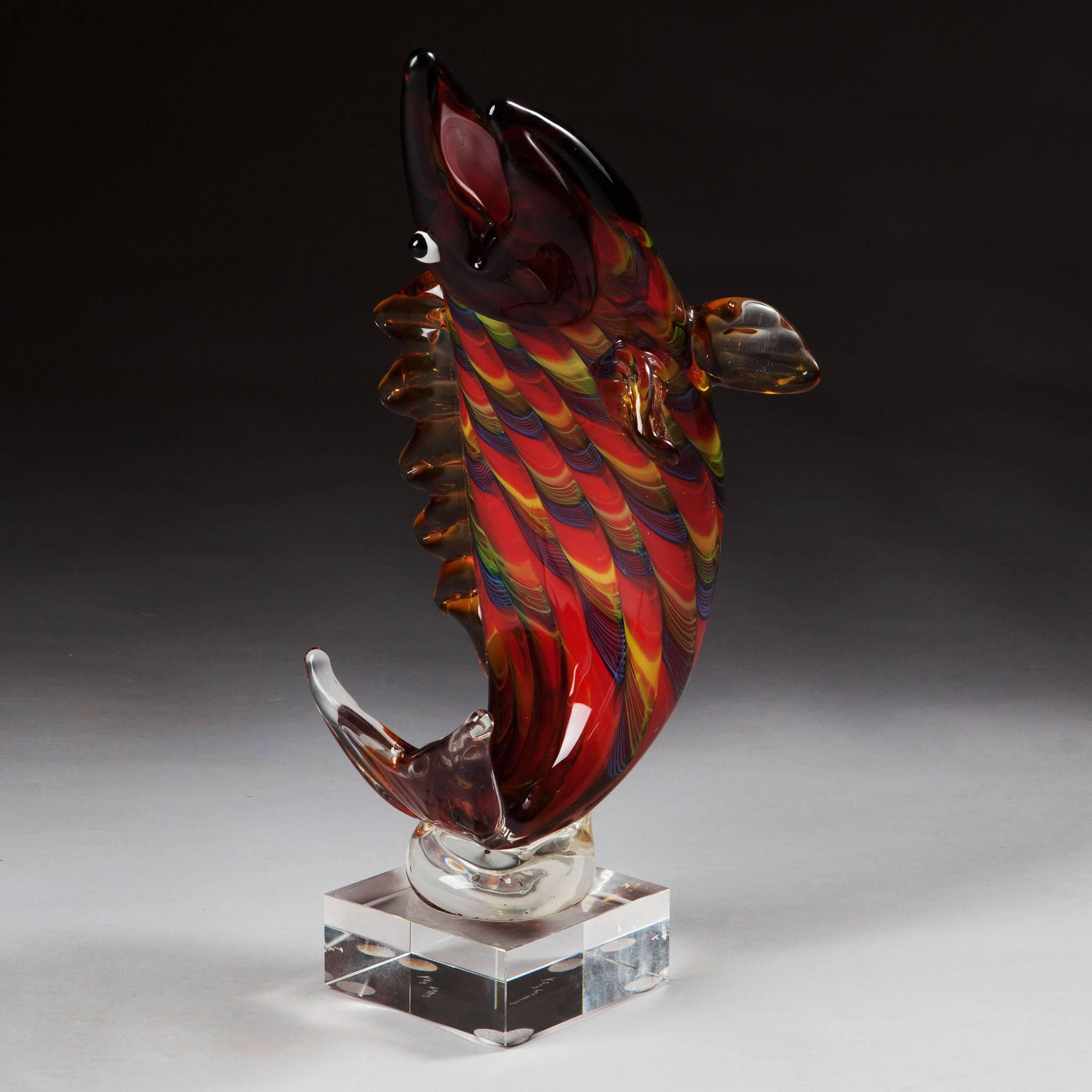Italy, Murano, 20th century.

A fine 20th-century colourful handmade glass statue of a leaping salmon, mouth open and eyes prominent.

Height 16 inches .
Width 6 inches .
Depth 6 inches.
