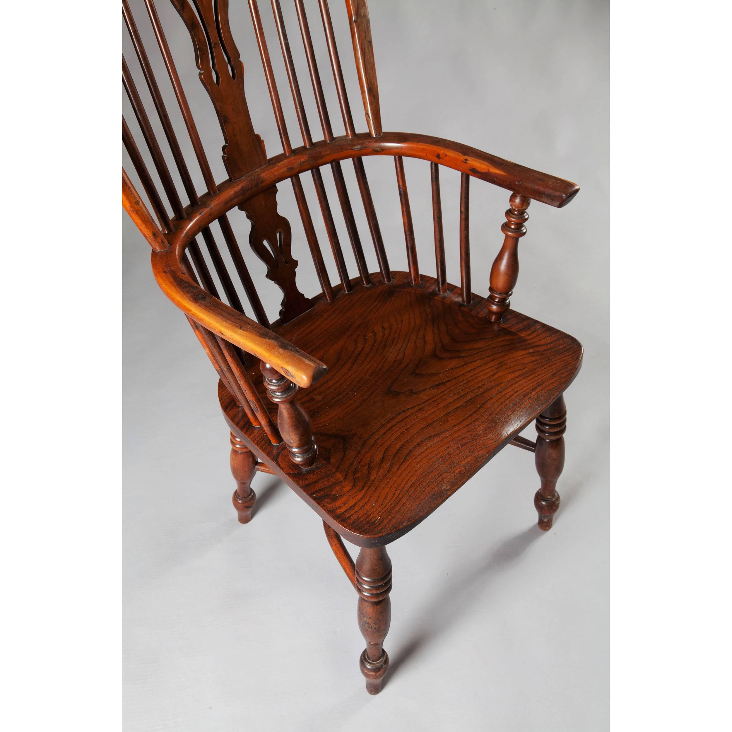 Early 19th century yew-wood windsor armchair with crinoline stretcher, well figured.

Measures: Height 110cm, 
width 52cm,
depth 52cm,
seat height 45cm.

The windsor chair is established as one of the great classics of English country
