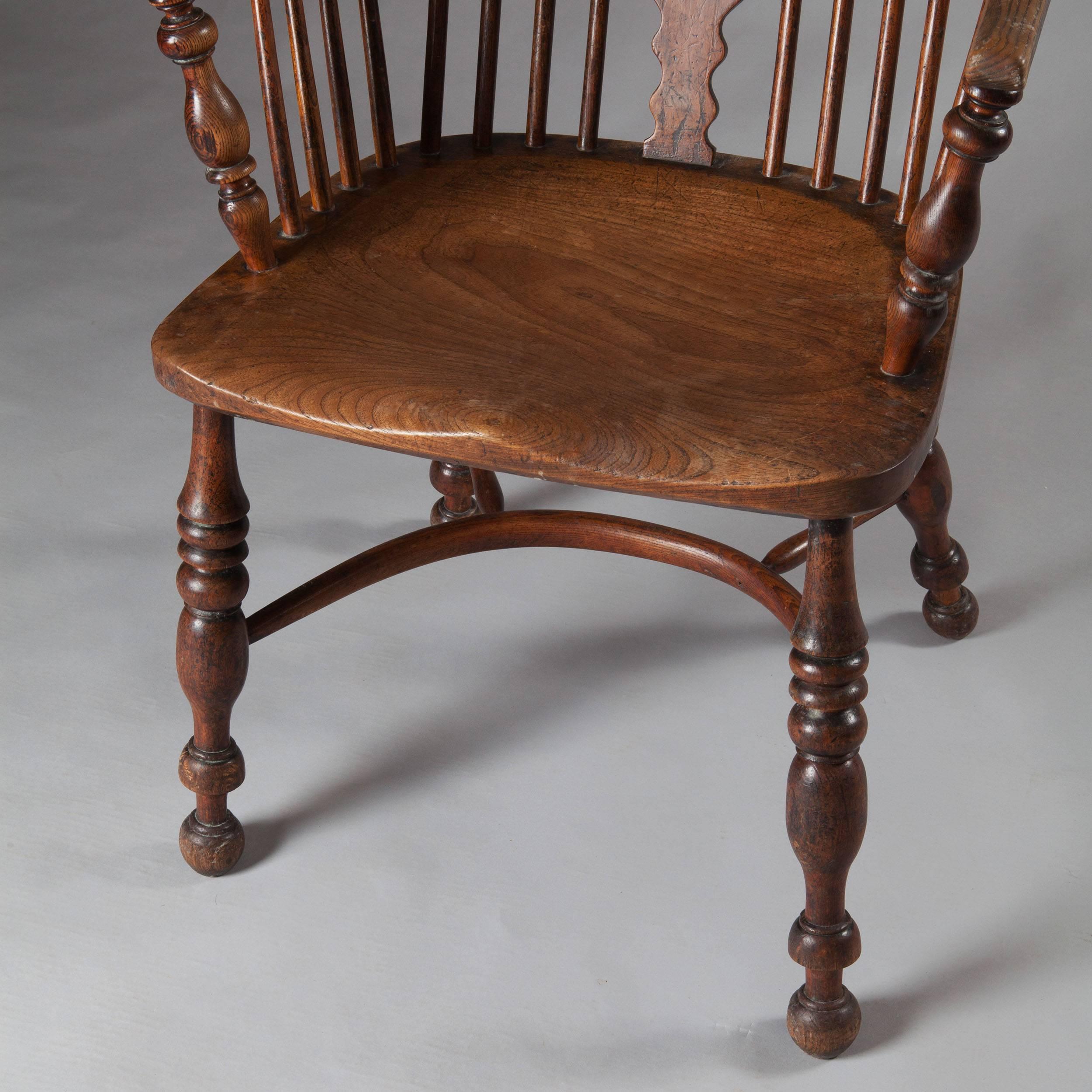 Early 19th century Yew-wood Windsor armchair with crinoline stretcher, well figured.

Measures: Height 118cm.
Width 63cm.
Depth 54cm.
​Seat Height 46cm.

The Windsor chair is established as one of the great classics of English country