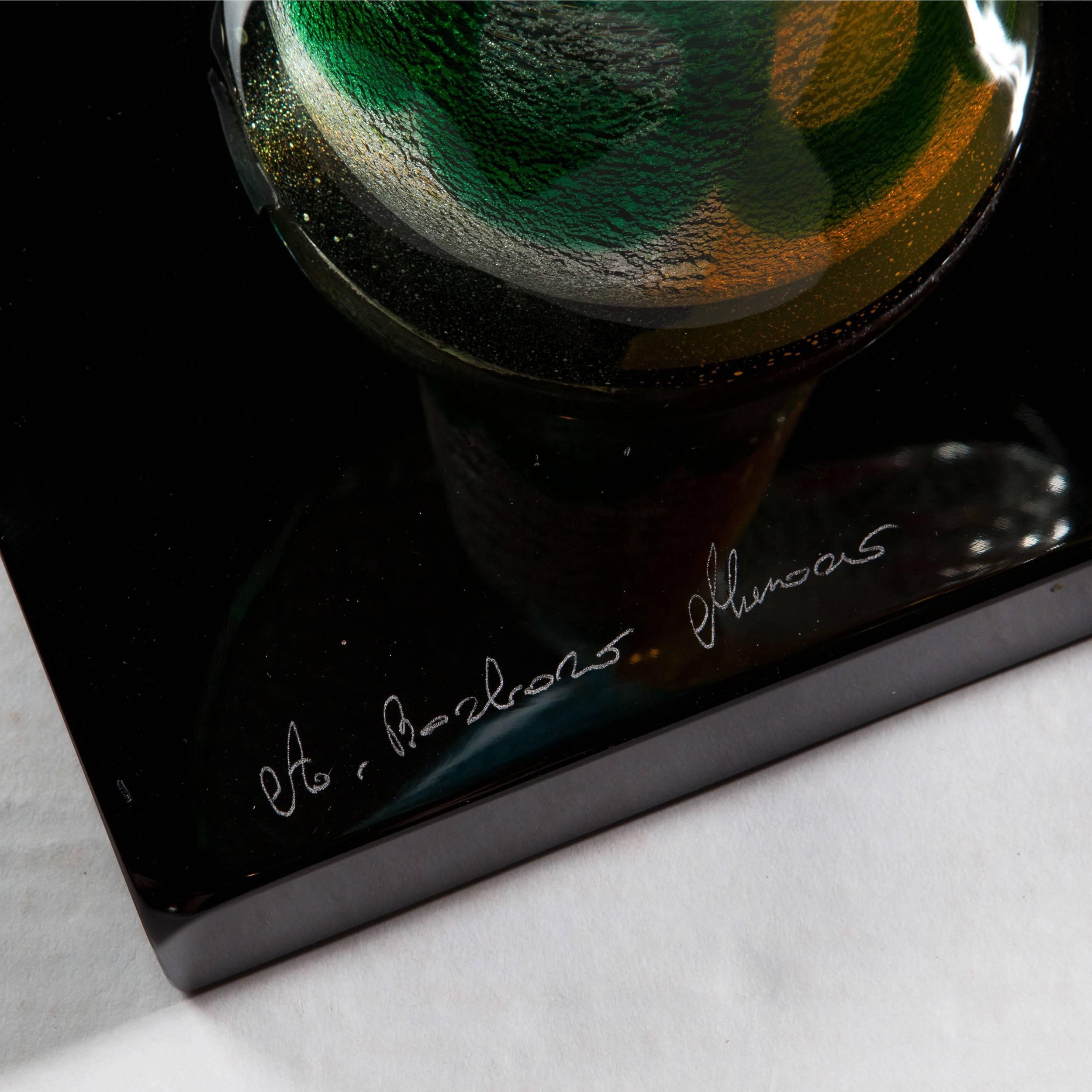 Italy, modern.

A fine glass sculpture of female figure, her head resting on her hand, mounted with a shaped hat. In homage to Picasso.
Measures:
Height 24inches (61cm).
Width 11inches (28cm).
Depth 10inches (26cm).
