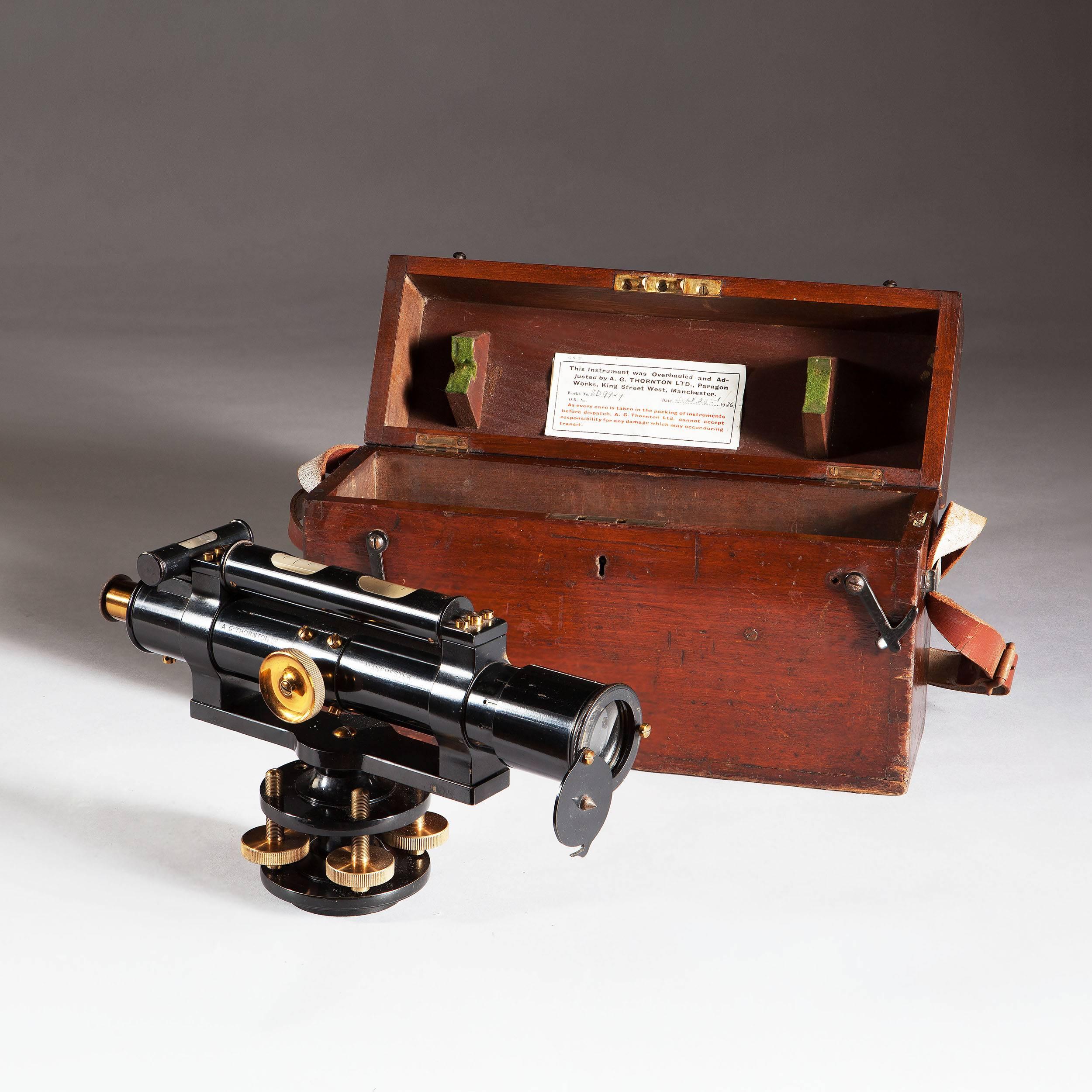 A surveyors Instrument signed and by A G Thornton of Manchester, retaining its original carrying case which has a label noting that Thornton restored the instrument in 1936.

Length 12 ins (30cms)