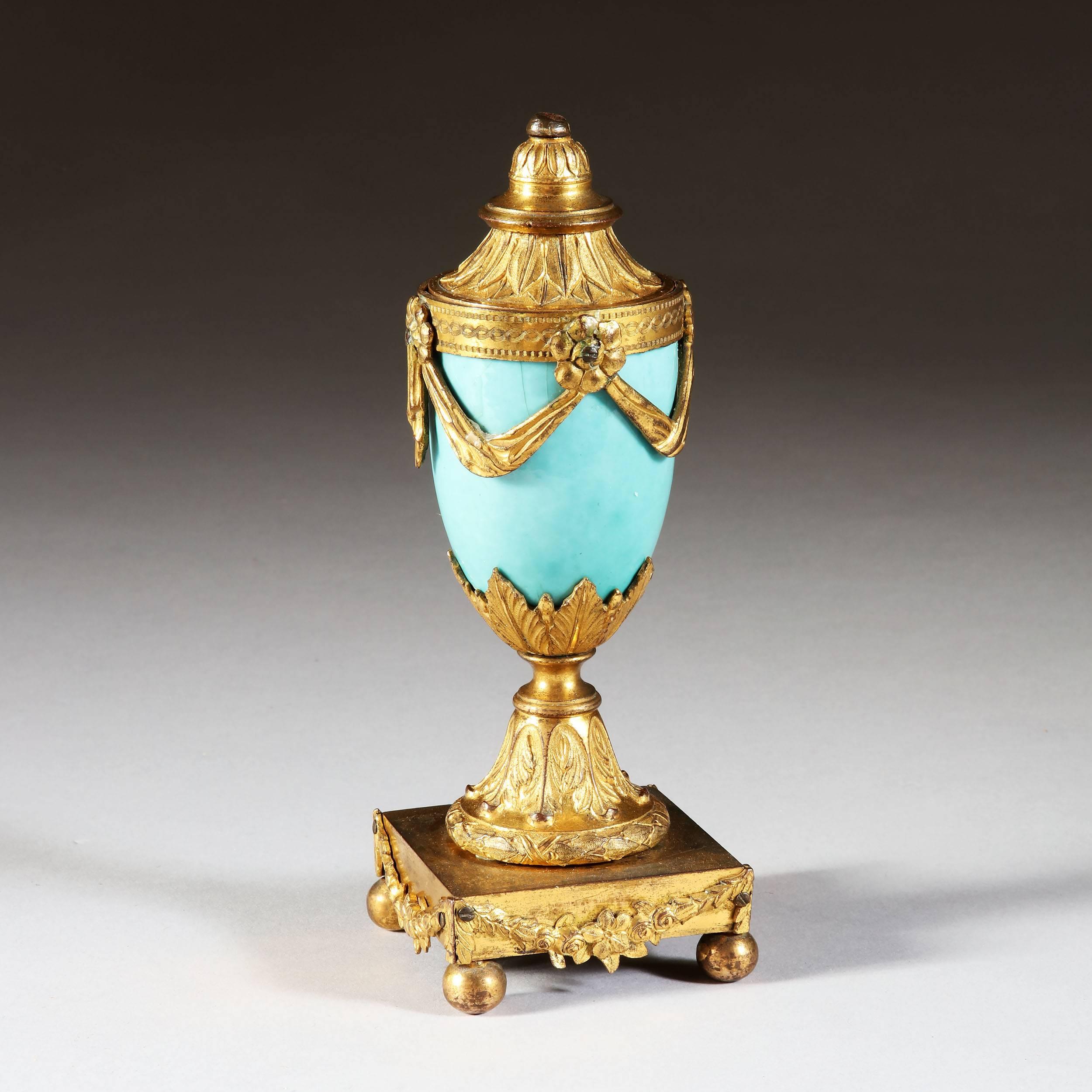 A rare and unusual duck egg blue enamel and gilt bronze cassolettes.

Attributed to Matthew Boulton,

England, circa 1780.

Measures: Height 8 ins (20 cms),
square (Approximately) 2.5ins.
 