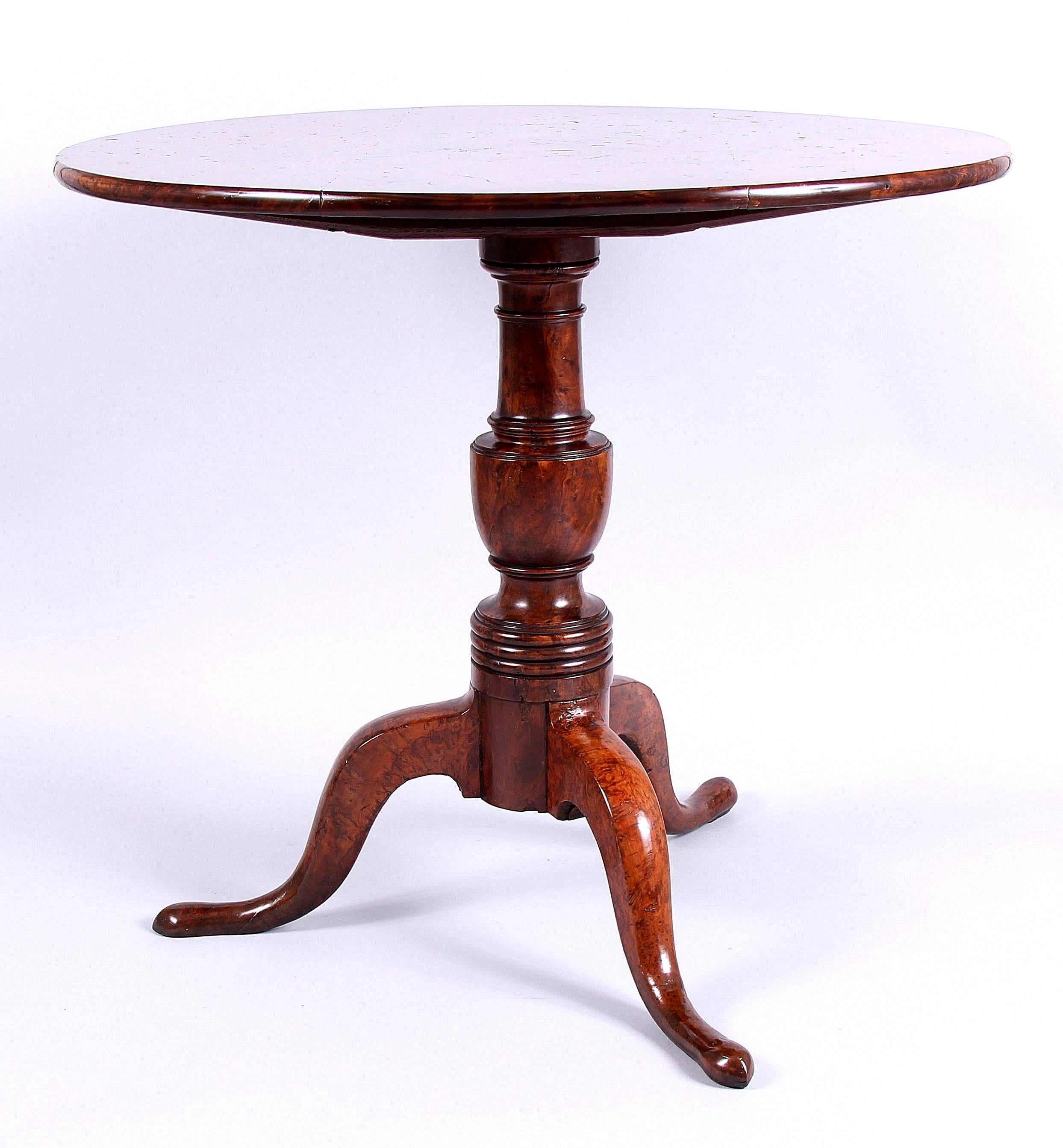 Incredibly rare George II solid burr yew tilt-top tripod table, circa 1740 with solid burr Yew top, solid burr yew column and solid burr yew legs.

Perhaps one of the rarest 18th century tables ever made. The colour, figuration and patina on this