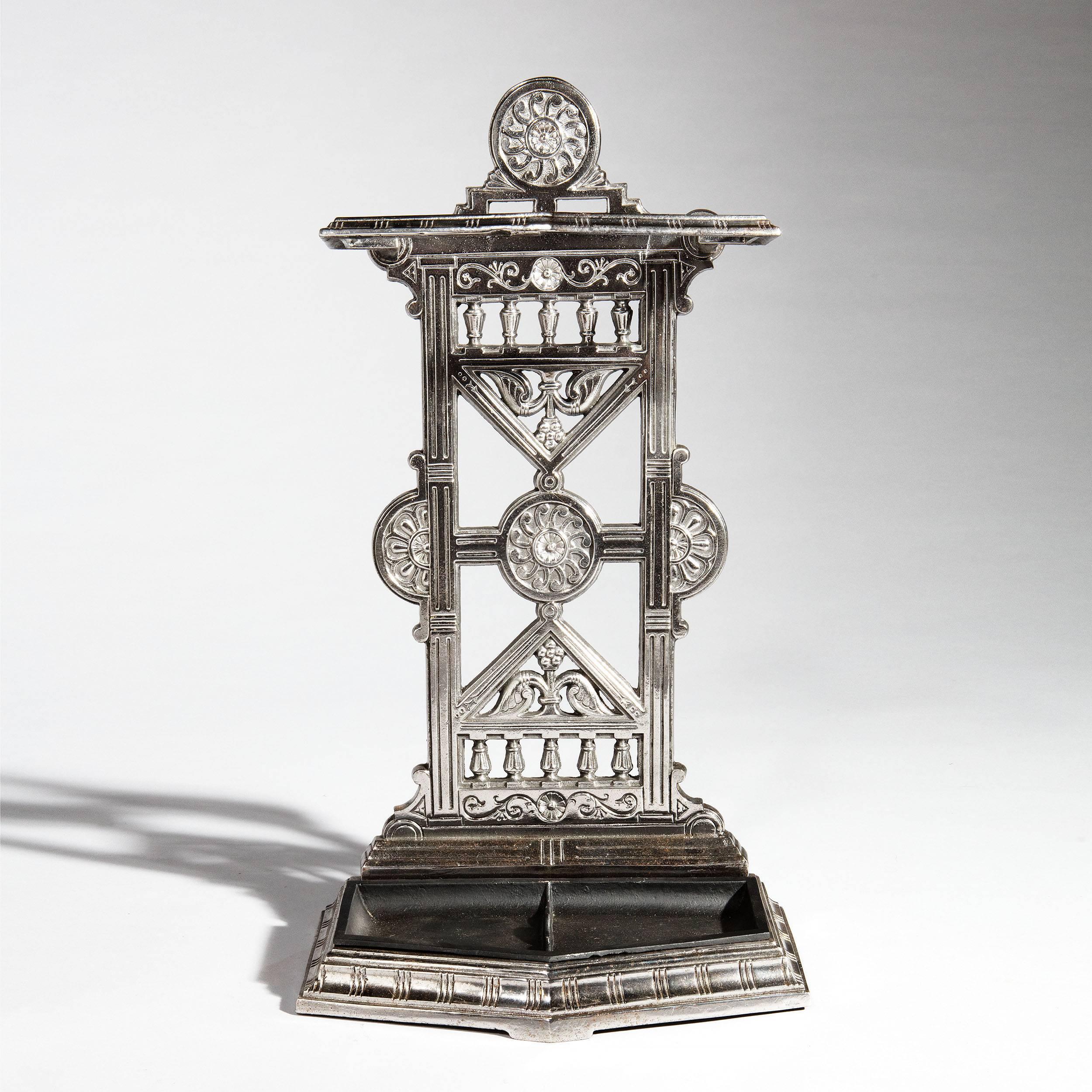 A polished cast iron hall stick stand decorated in relief in the Arts and Crafts japoneserie manner reminiscent of Thomas Jekyll.

The reverse bearing an illegible stamp and the design registration diamond,

England, 1880.

Measures: Height 27