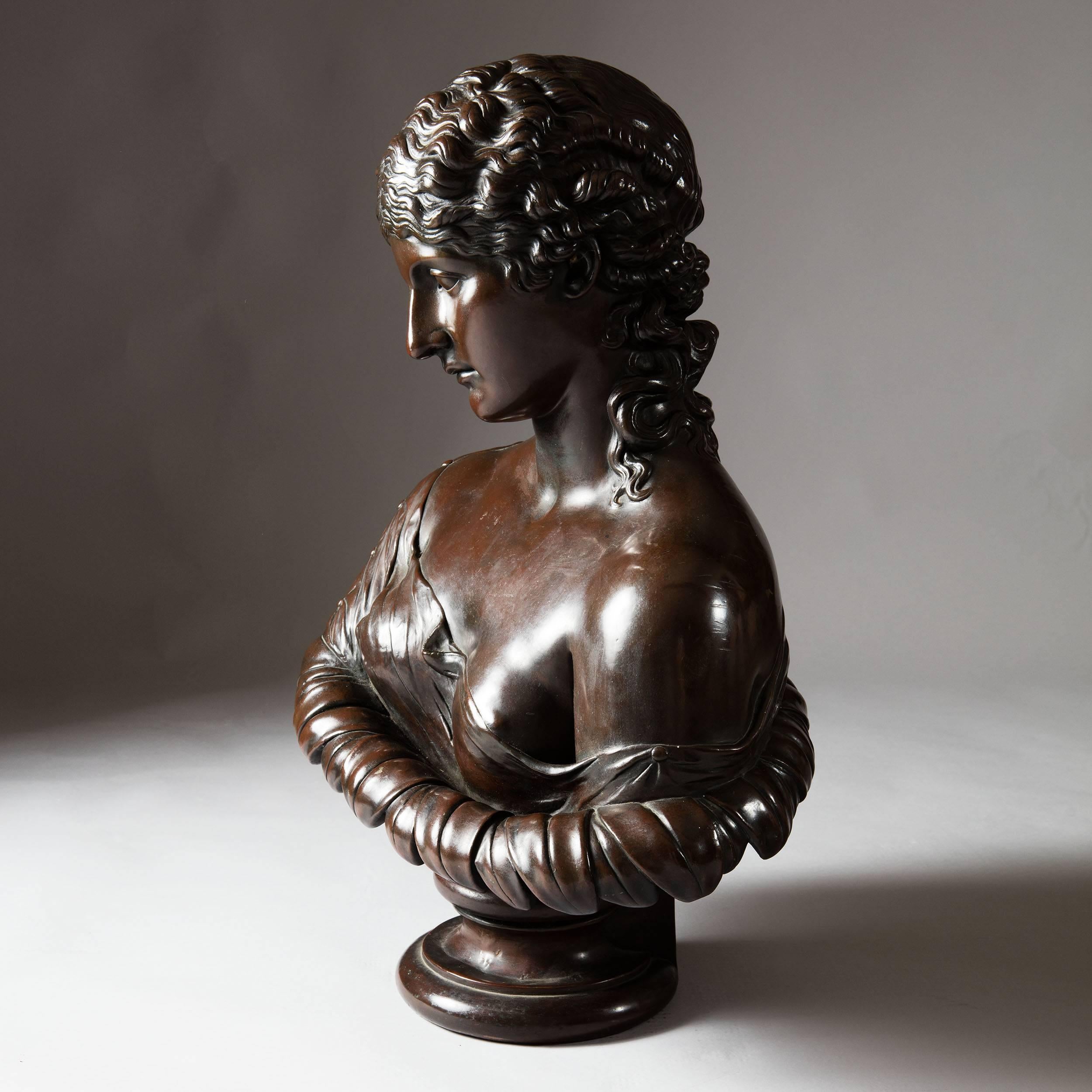 Northern Europe, 19th Century. 

A large electrotype patinated bronze on copper sculptural bust of Clytie raised on integral socle.

Measures: Height 29 inches. 

Clytie was a name given to a number of figures in Greek mythology. However, the