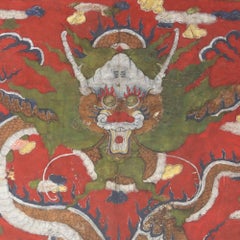 Pittura mitologica tibetana del drago rosso su pergamena