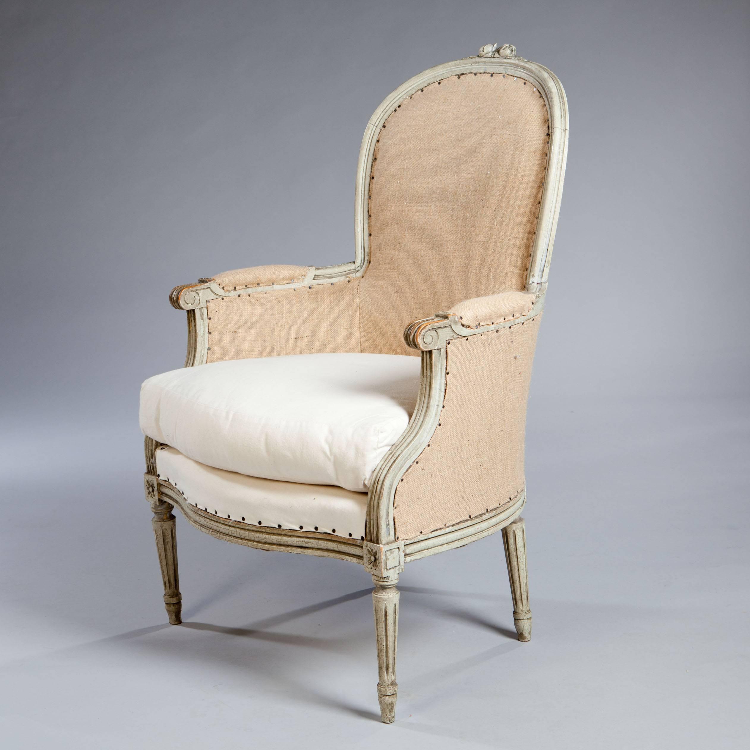Carved A Fine Pair of French Neoclassical Bergere Armchairs