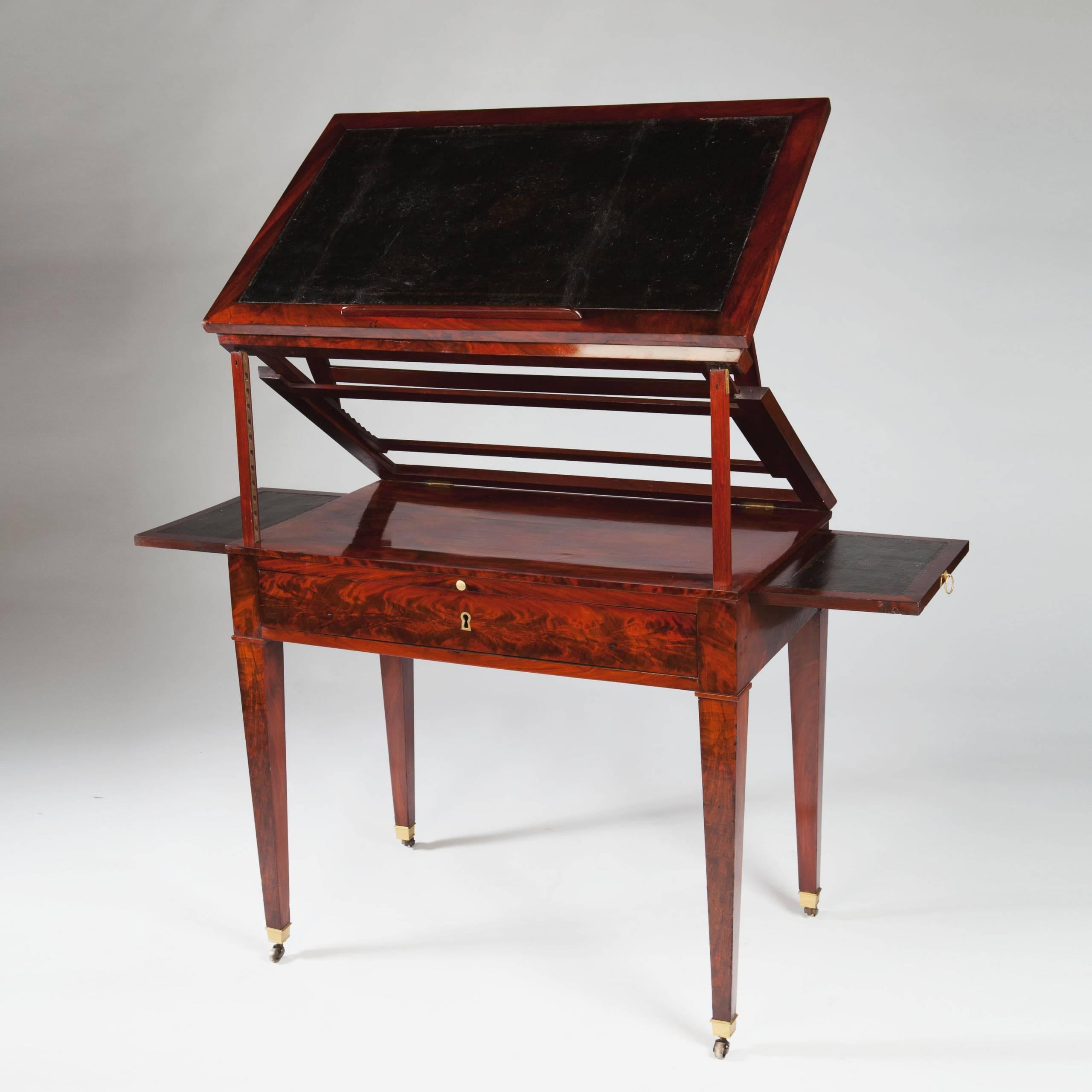 France, circa 1800.

A rare and highly figured early 19th century flame mahogany architects table 