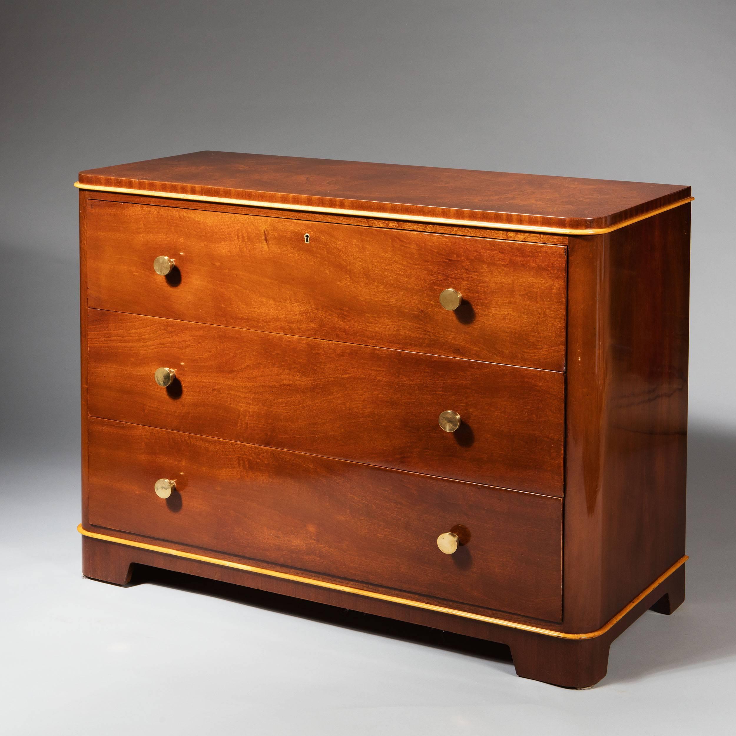 A pair of Art Deco mahogany and lemon-wood commodes. by DE COENE FRERES

France, circa 1925

These two commodes were produced by DE COENE Frères, Courtrai, in Belgium. The commodes are part of a De Coene bedroom suite, model JACQUELINE.

We are