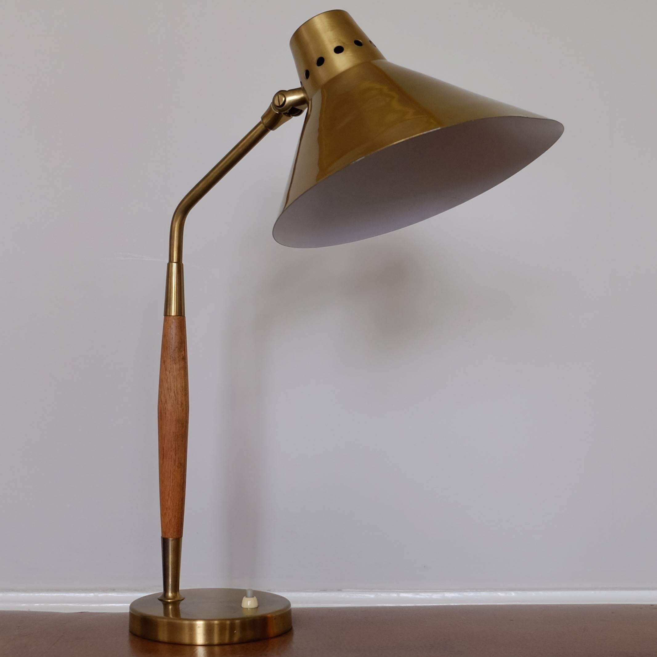 Swedish table lamp in teak and brass by Boréns, 1950s. Great patina and adjustable shade.
 