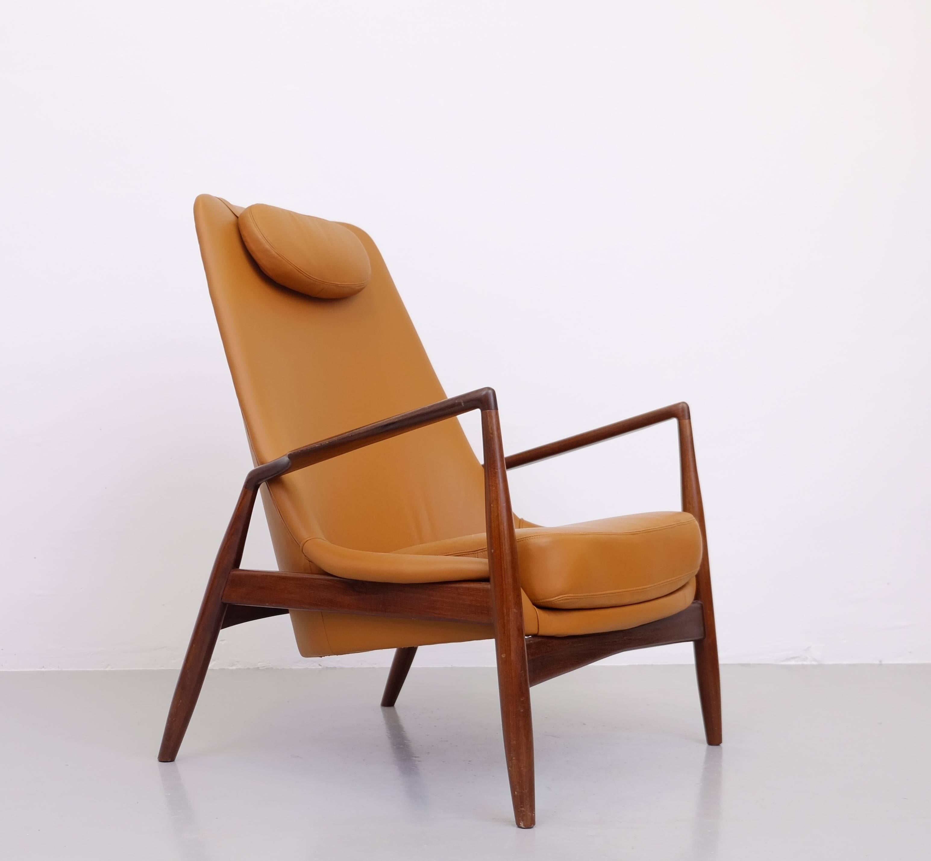 Ib Kofod-Larsen seal easy chair. Genuine cognac brown leather. Produced by OPE.