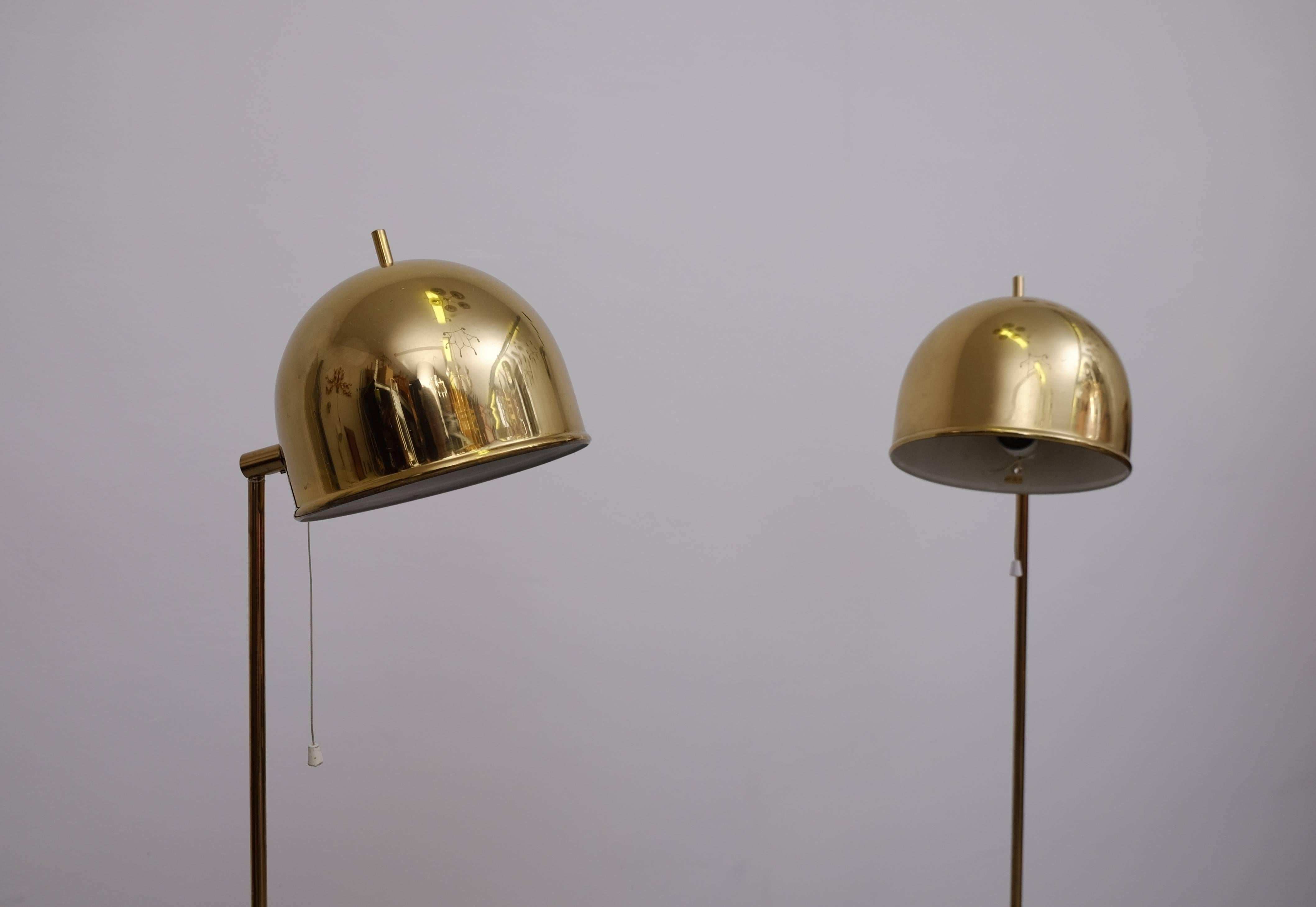 Set of two floor lamps in brass, model G-075 manufactured by Bergboms, Sweden, 1960s.